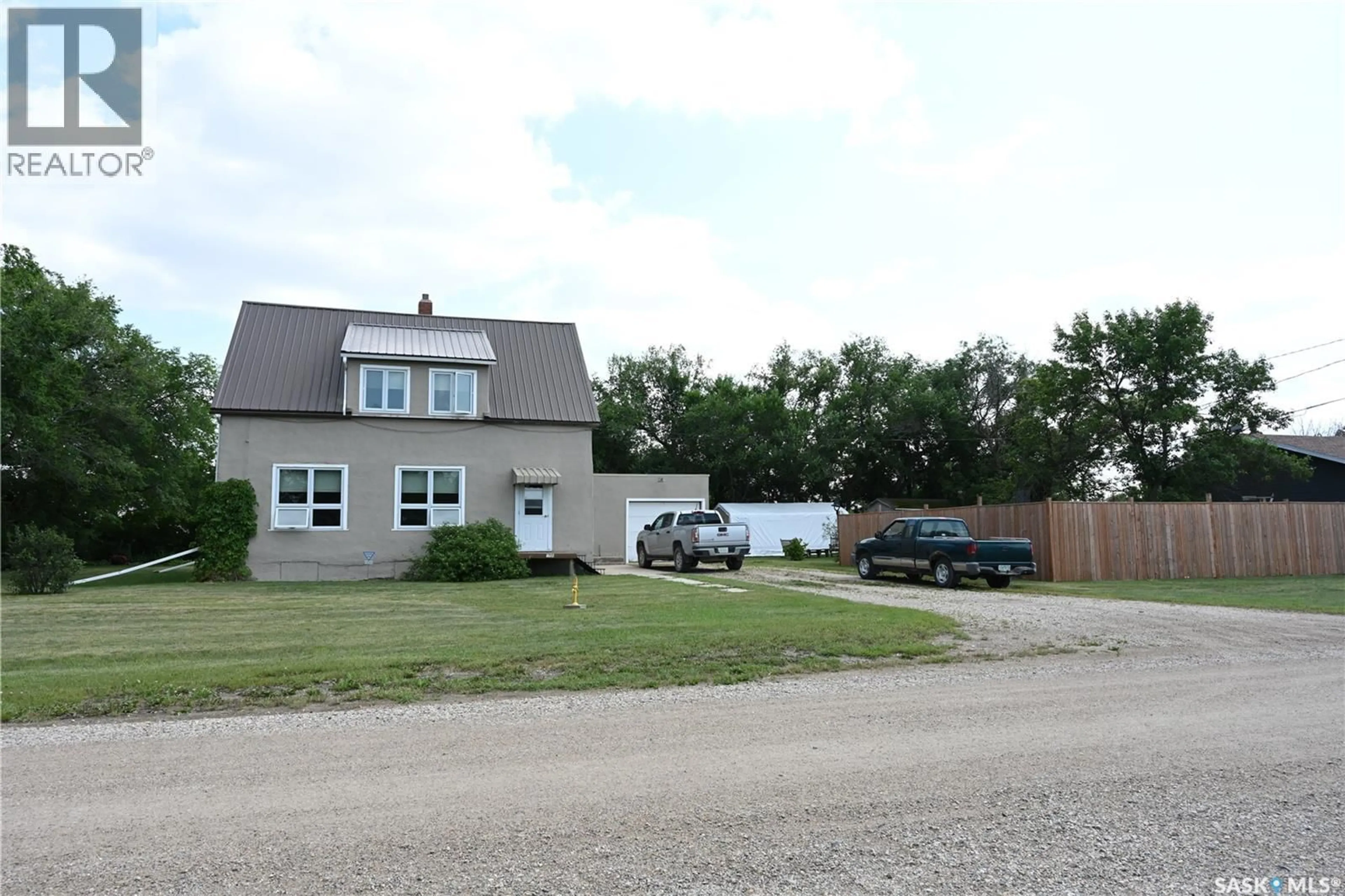 A pic from outside/outdoor area/front of a property/back of a property/a pic from drone, street for 111 3RD AVENUE, Hanley Saskatchewan S0G2E0