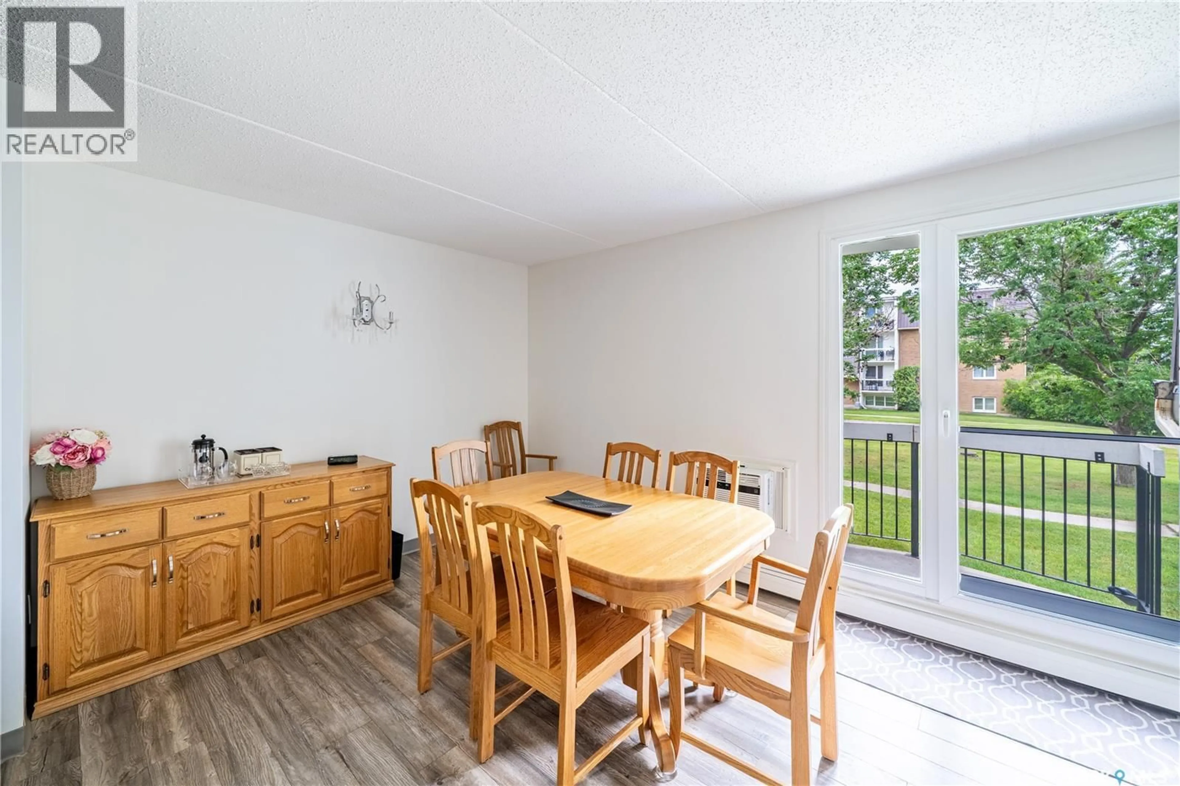 Dining room, wood/laminate floor for 35 - 21 CENTENNIAL STREET, Regina Saskatchewan S4N6P8