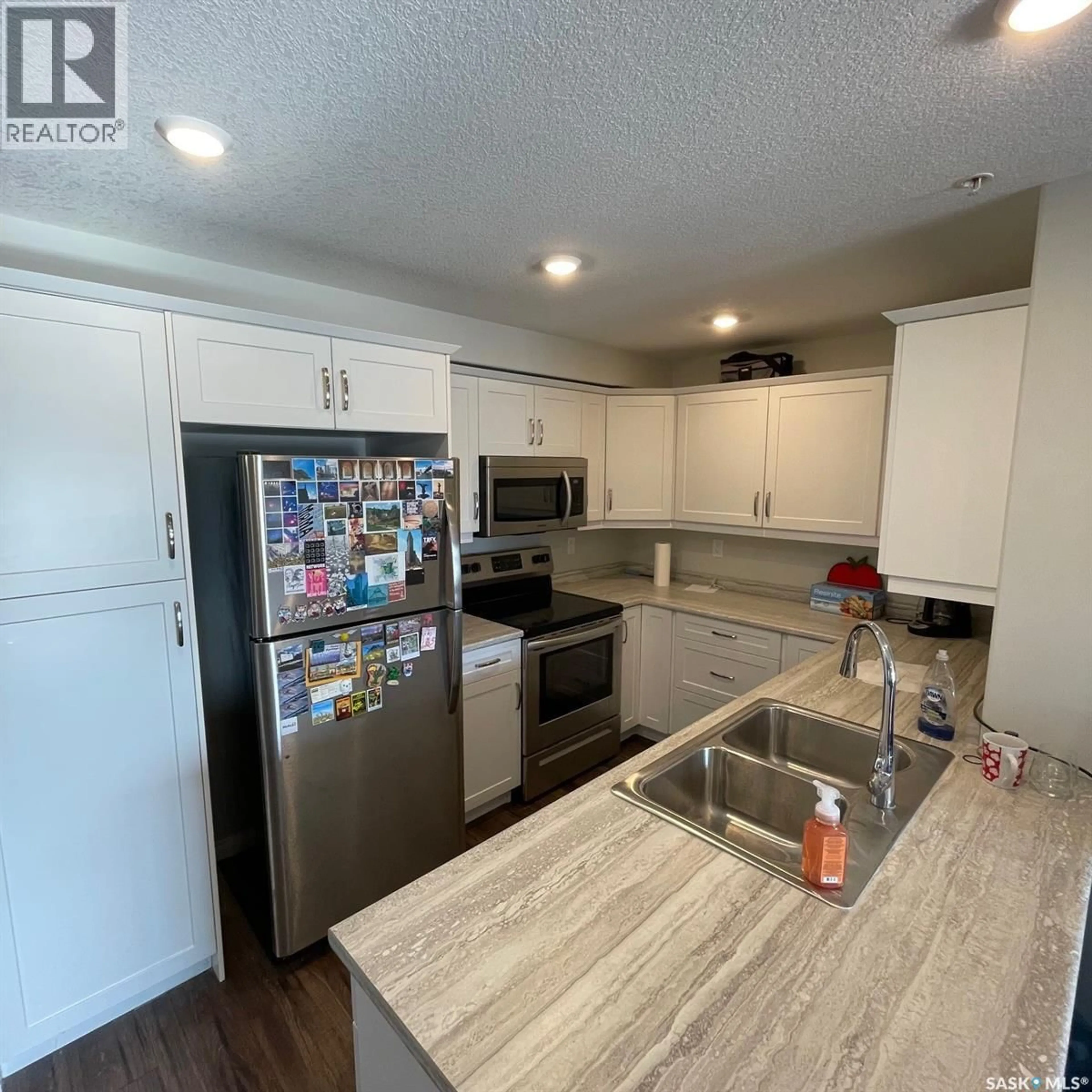 Open concept kitchen, unknown for 106 - 3202 WILLIS CRESCENT, Saskatoon Saskatchewan S7T0T1