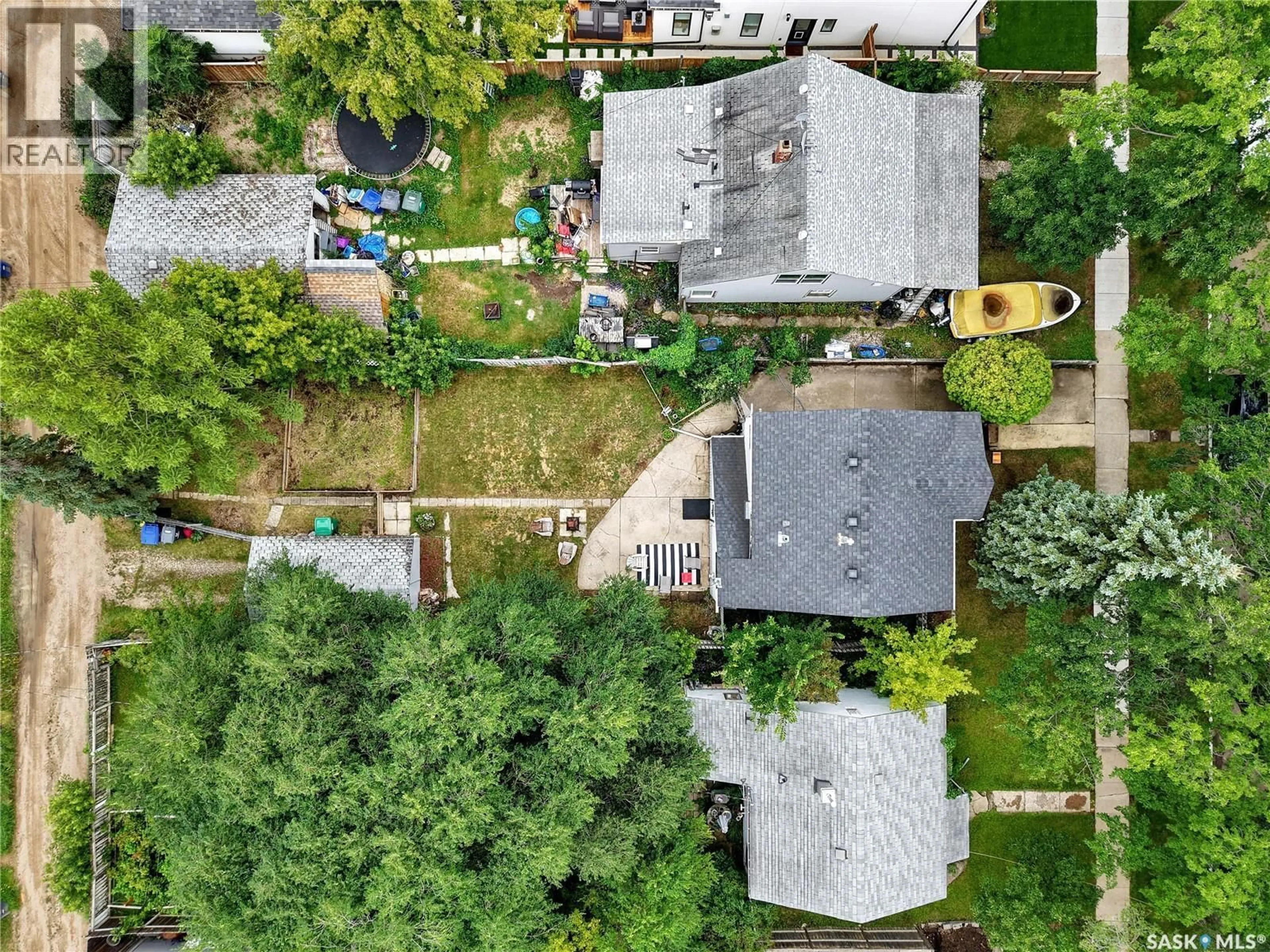 A pic from outside/outdoor area/front of a property/back of a property/a pic from drone, street for 219 MAPLE STREET, Saskatoon Saskatchewan S7J0A3