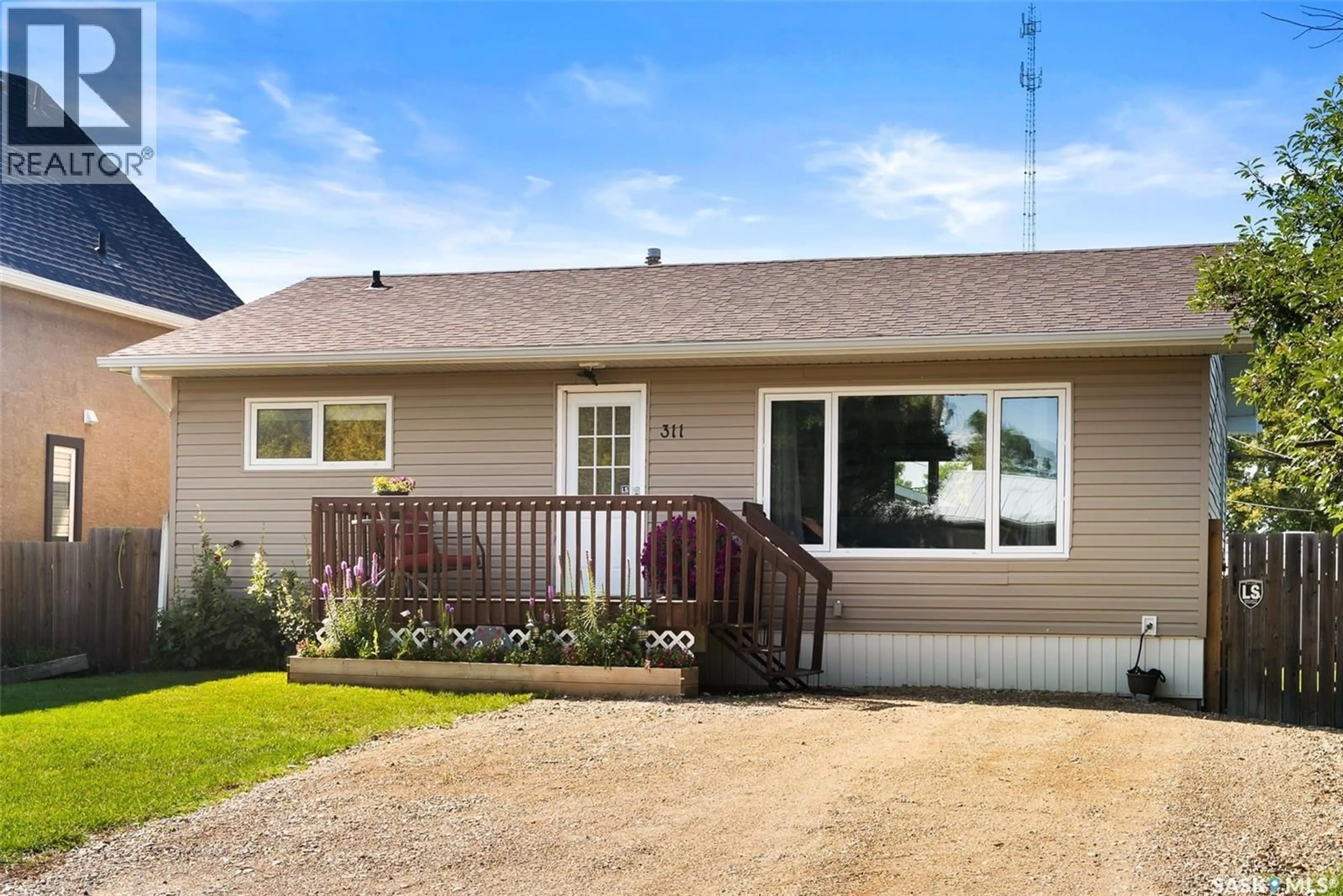 Home with vinyl exterior material, street for 311 COTEAU STREET, Milestone Saskatchewan S0G3L0