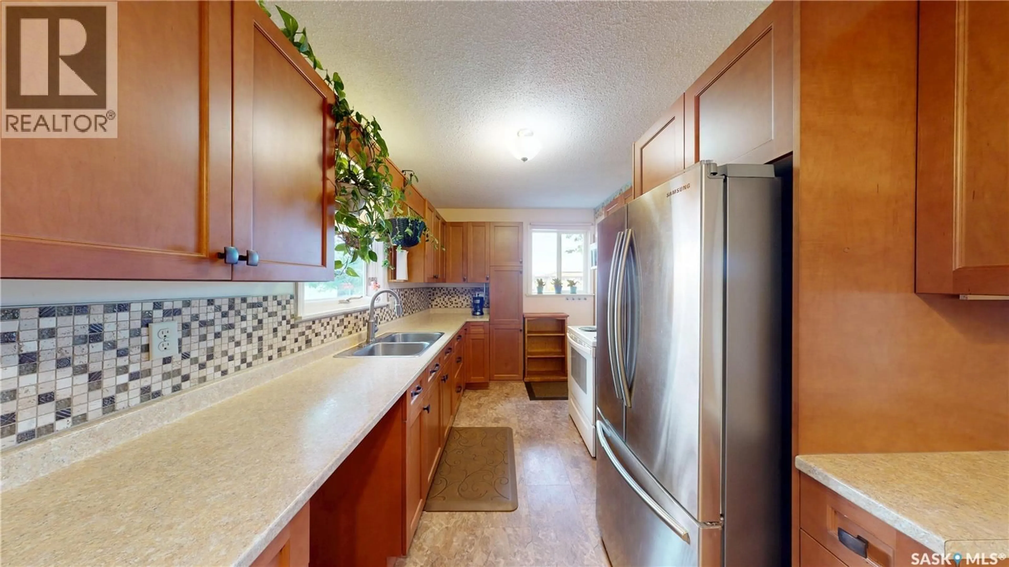 Standard kitchen, ceramic/tile floor for 1101 MCNAUGHTON AVENUE, Saskatoon Saskatchewan S7M3X6