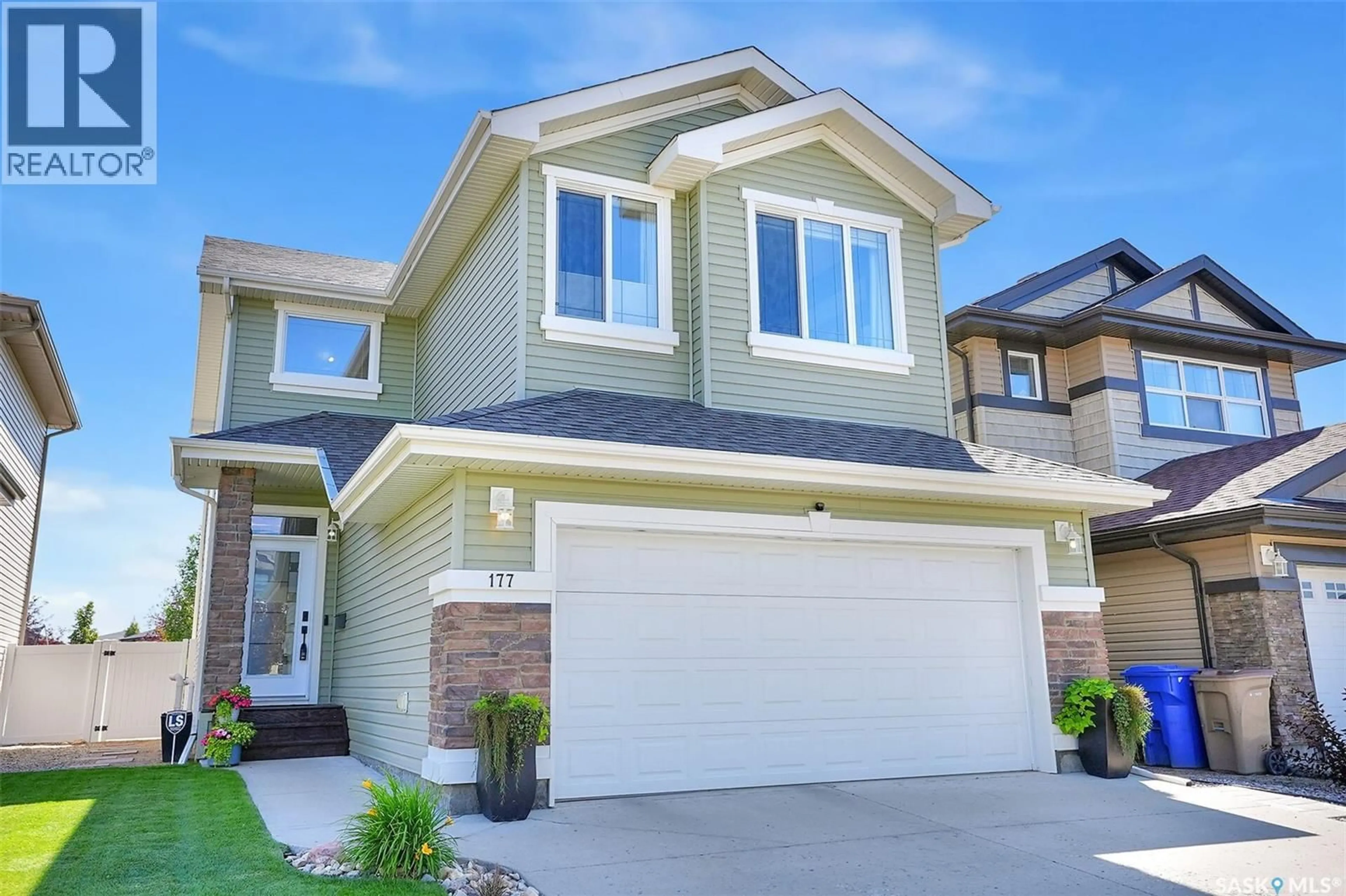 Home with brick exterior material, street for 177 POPLAR BLUFF CRESCENT, Regina Saskatchewan S4Y0B4