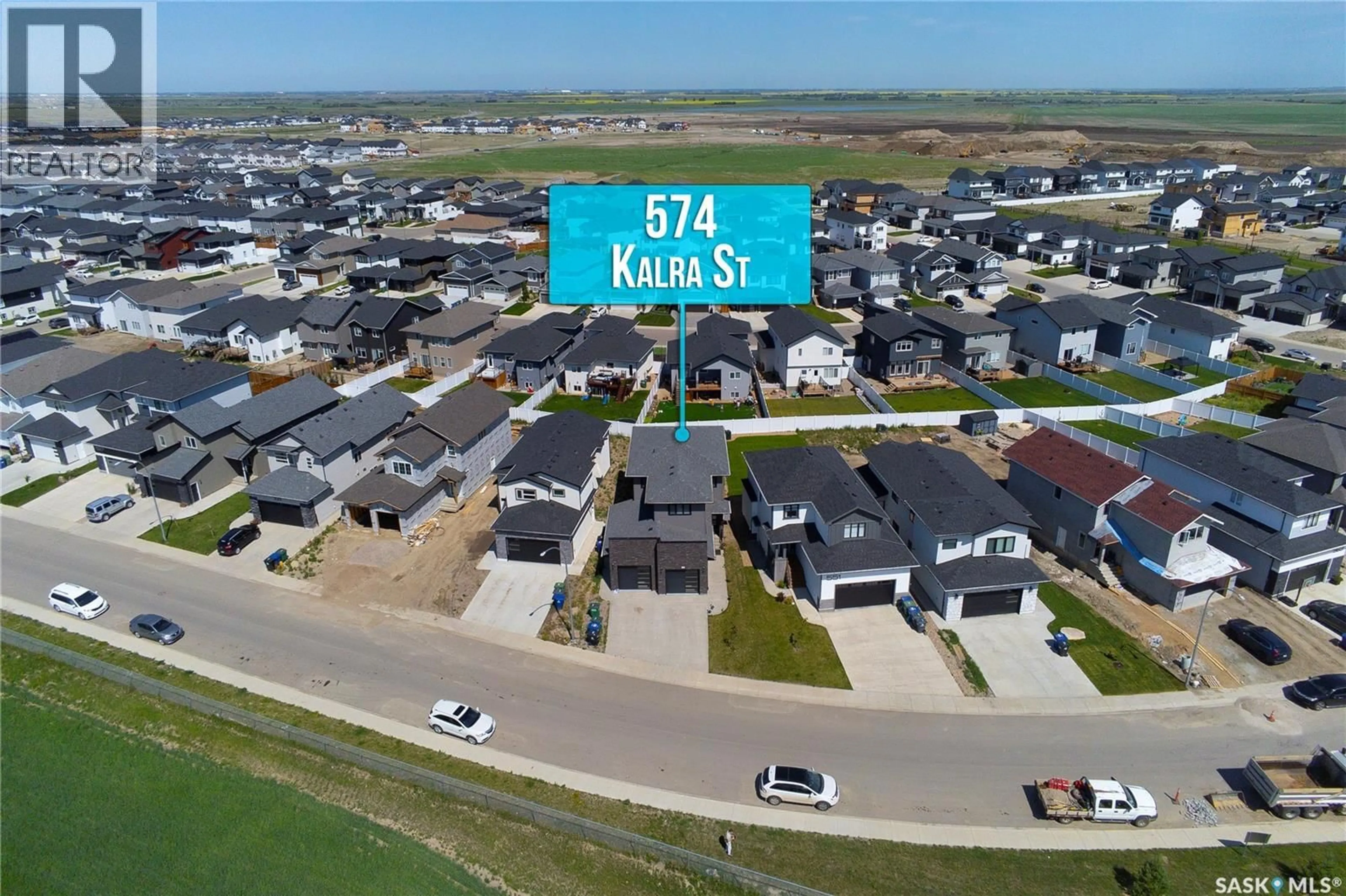 A pic from outside/outdoor area/front of a property/back of a property/a pic from drone, street for 547 KALRA STREET, Saskatoon Saskatchewan S7W1E8