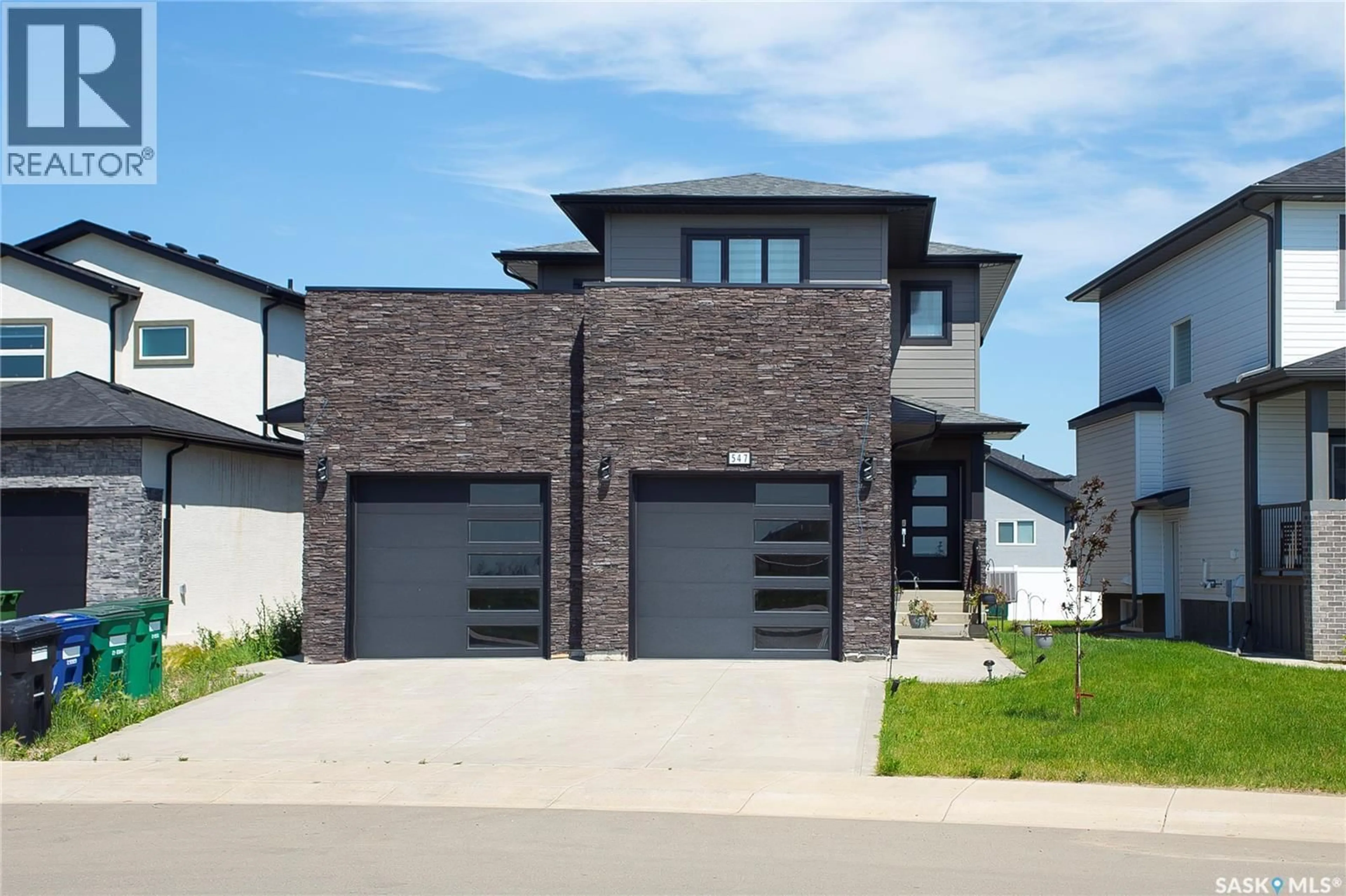 Home with brick exterior material, street for 547 KALRA STREET, Saskatoon Saskatchewan S7W1E8