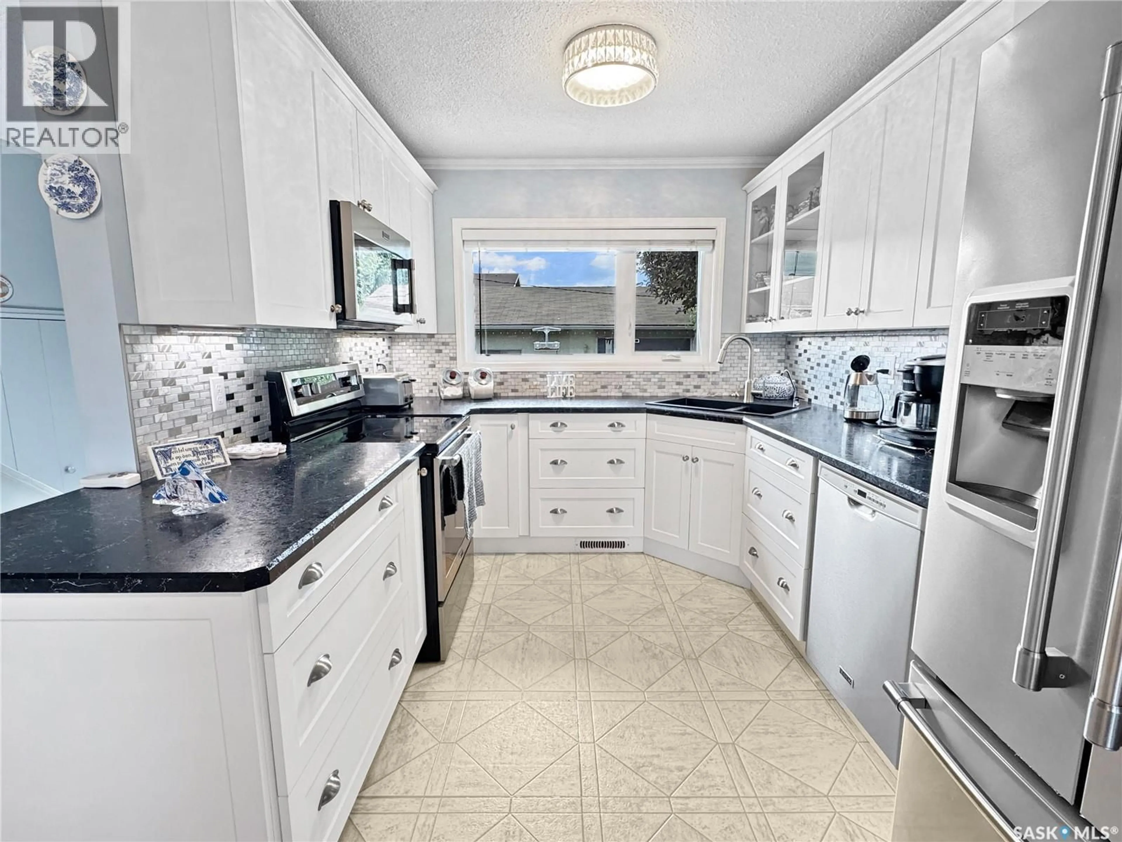 Standard kitchen, ceramic/tile floor for 2107 101ST CRESCENT, North Battleford Saskatchewan S9A1C2