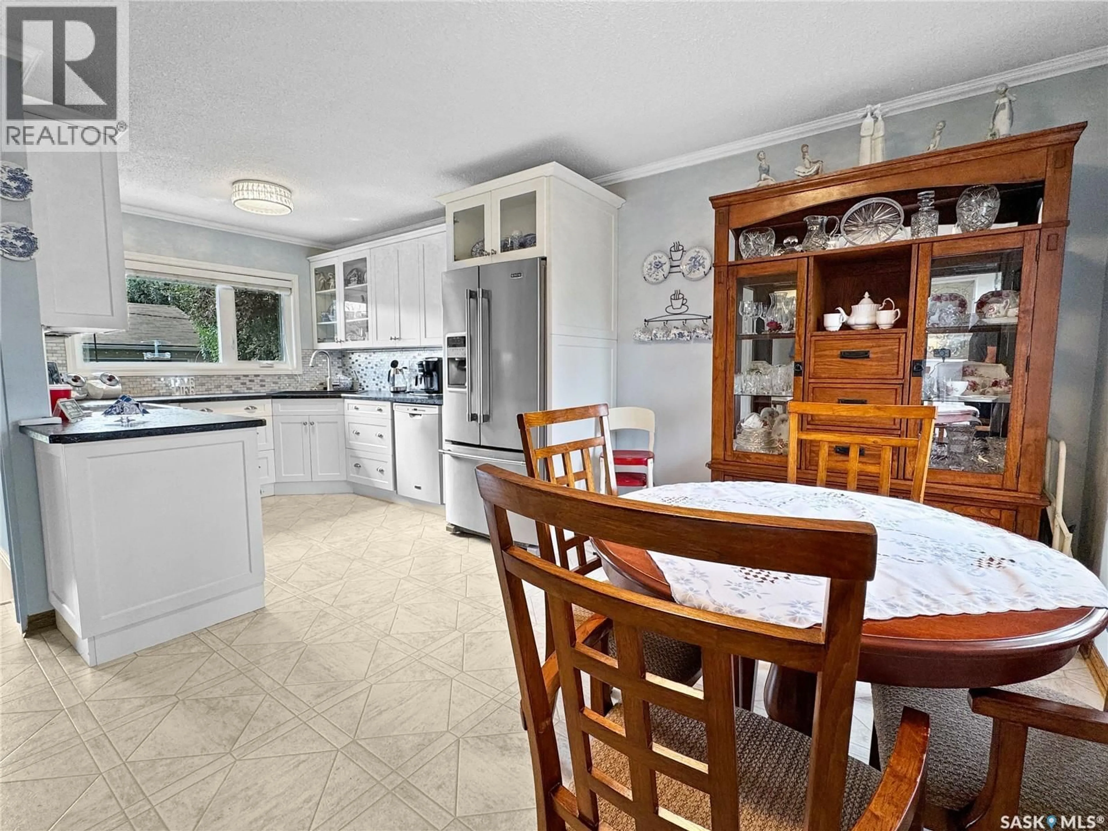 Open concept kitchen, ceramic/tile floor for 2107 101ST CRESCENT, North Battleford Saskatchewan S9A1C2