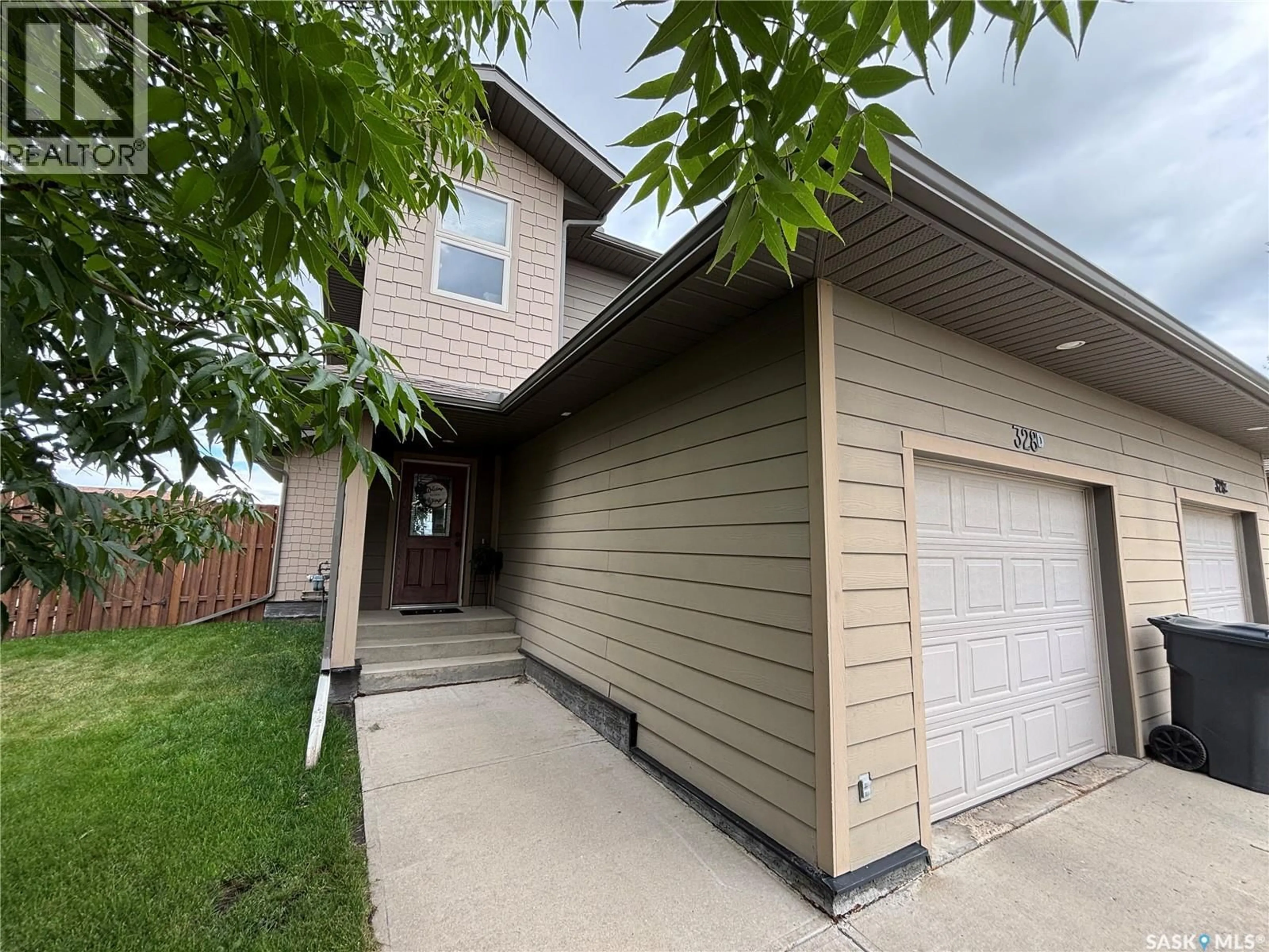 Home with vinyl exterior material, street for #D - 328 MORRISON DRIVE, Yorkton Saskatchewan S3N4G2