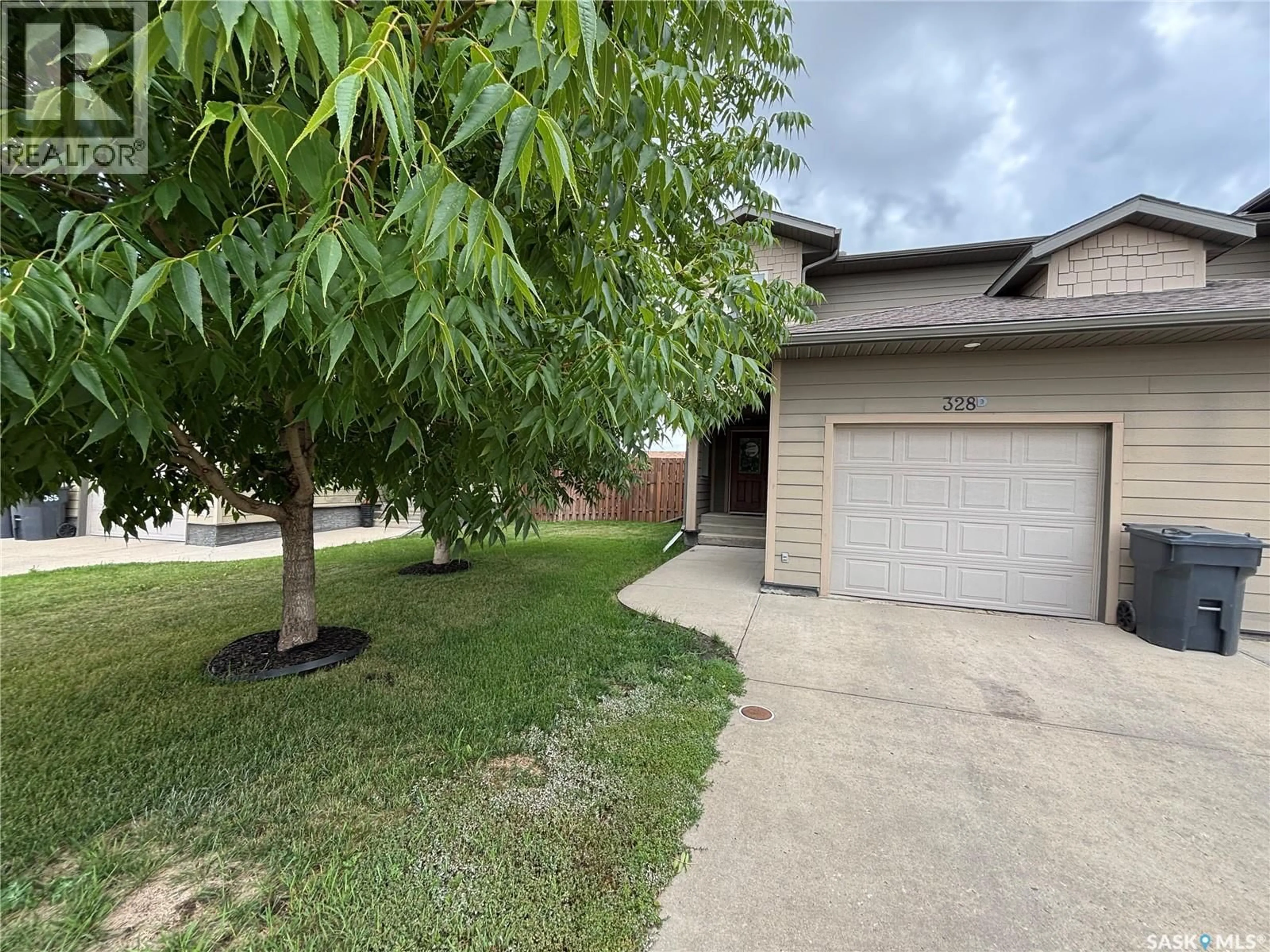 A pic from outside/outdoor area/front of a property/back of a property/a pic from drone, street for #D - 328 MORRISON DRIVE, Yorkton Saskatchewan S3N4G2