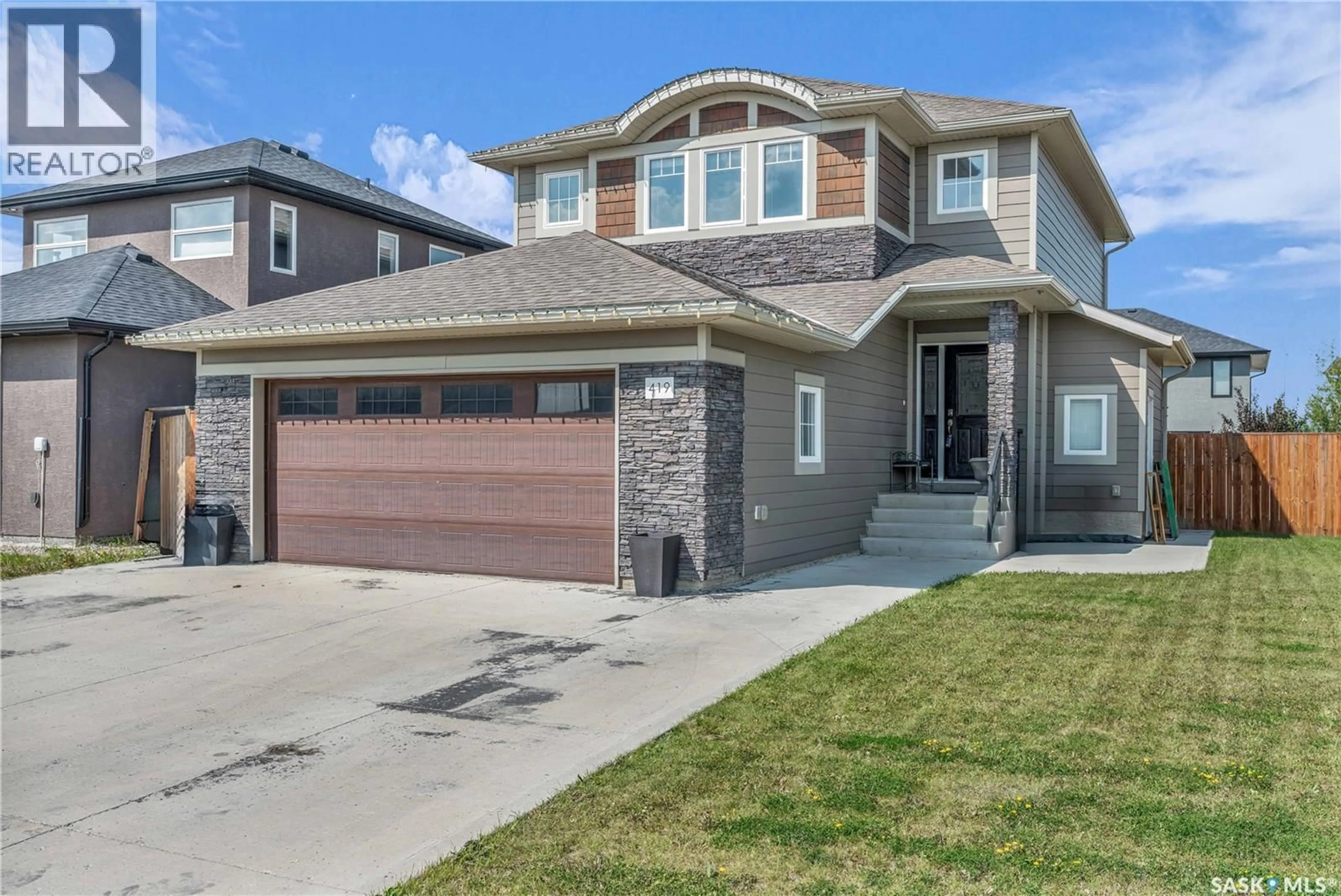 Home with brick exterior material, street for 419 PICHLER CRESCENT, Saskatoon Saskatchewan S7V0H2