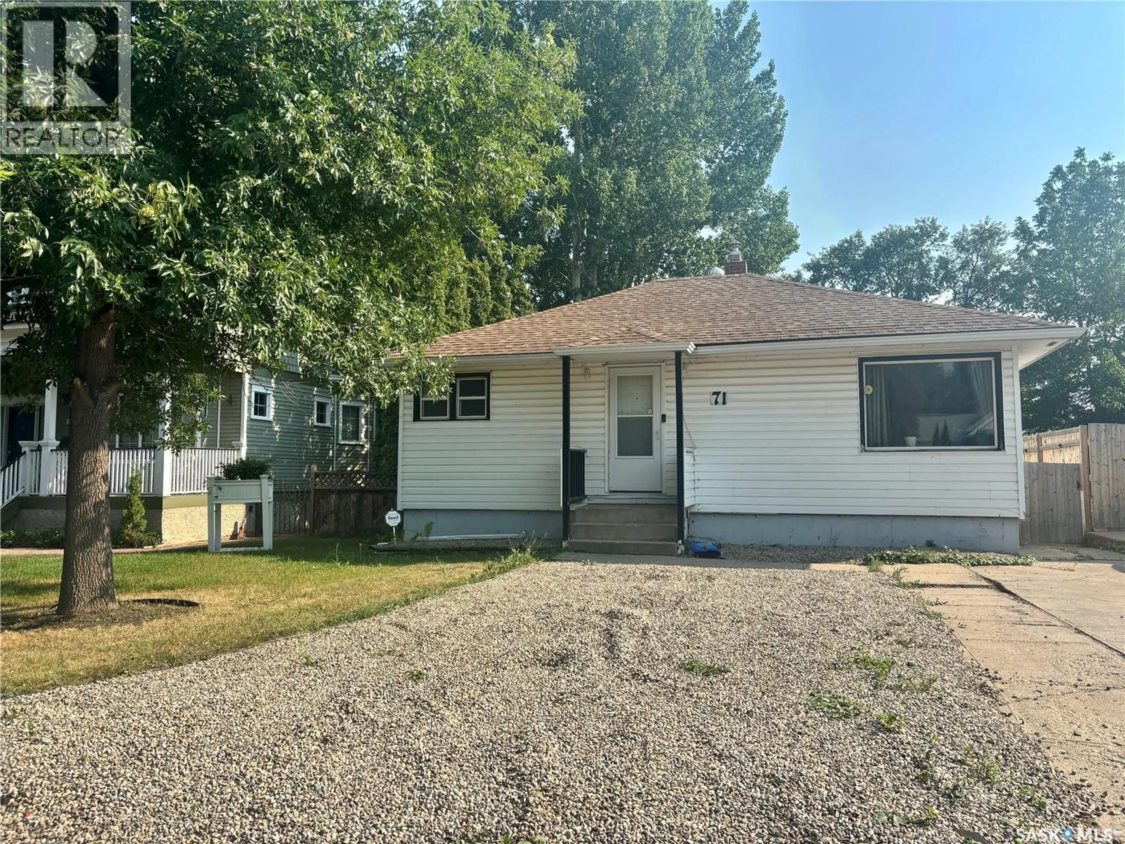 Home with vinyl exterior material, street for 71 22ND STREET, Prince Albert Saskatchewan S6V1M8
