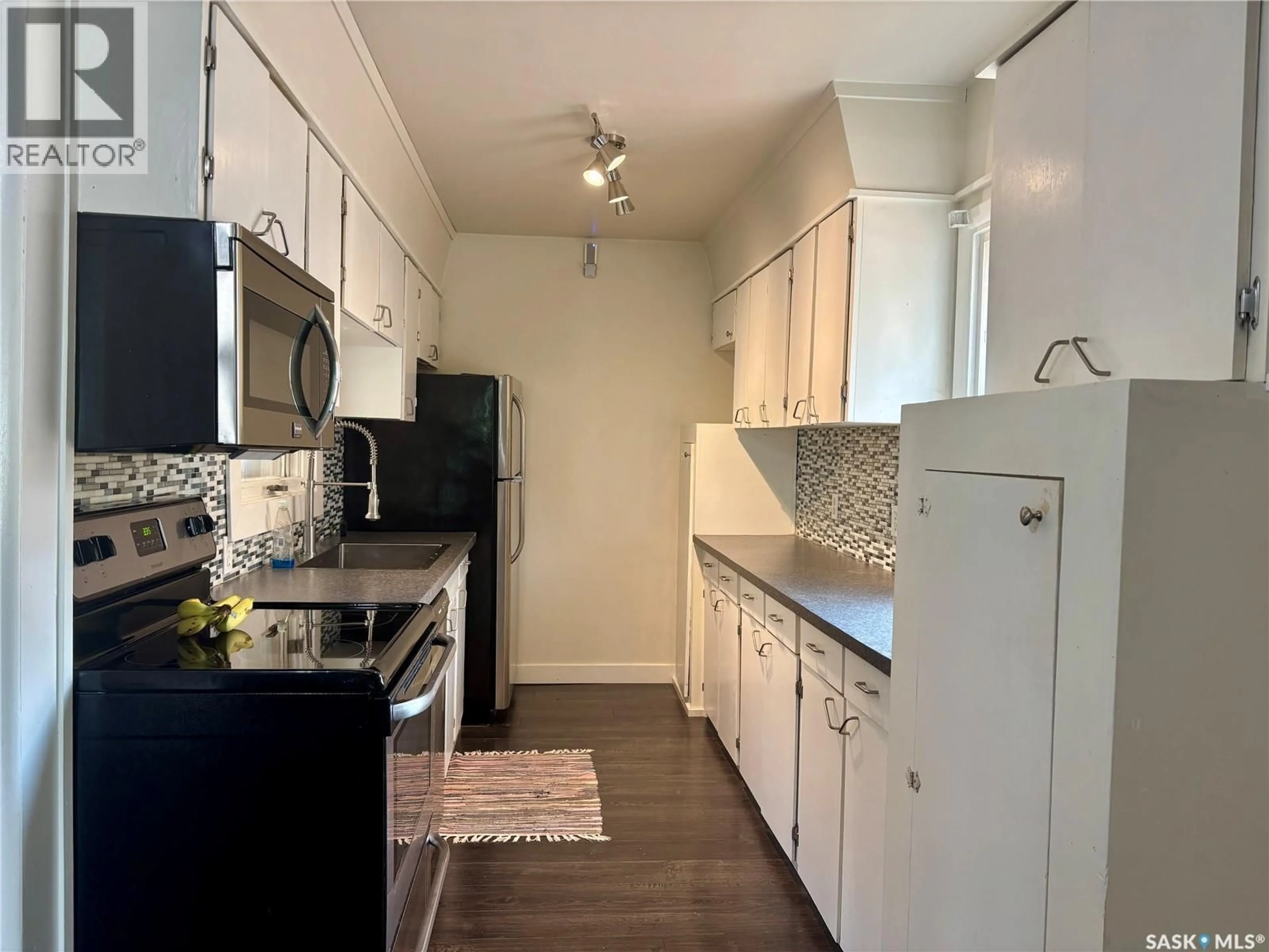 Standard kitchen, wood/laminate floor for 71 22ND STREET, Prince Albert Saskatchewan S6V1M8