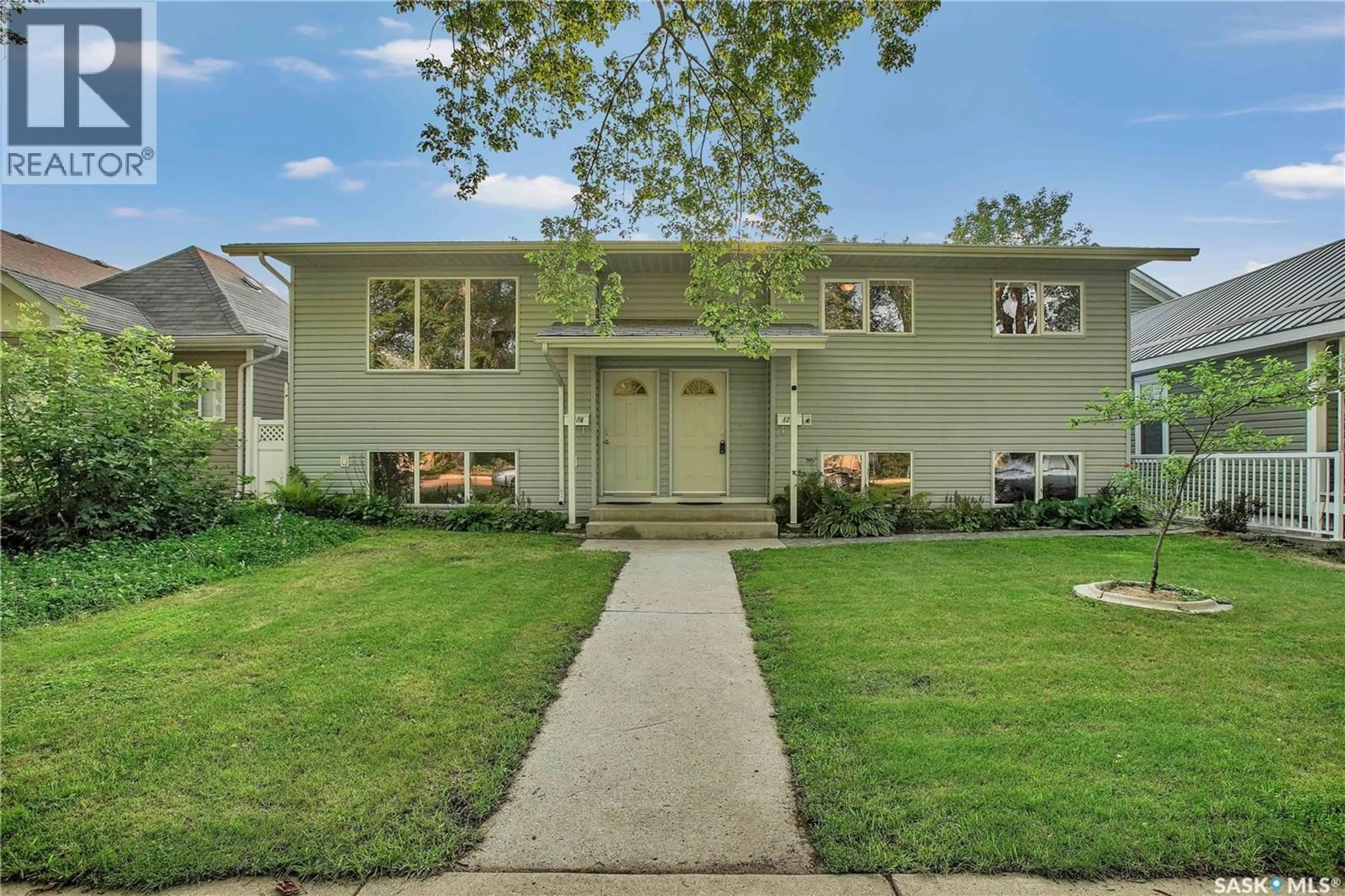 Home with vinyl exterior material, street for 1202-1204 COY AVENUE, Saskatoon Saskatchewan S7M0H1