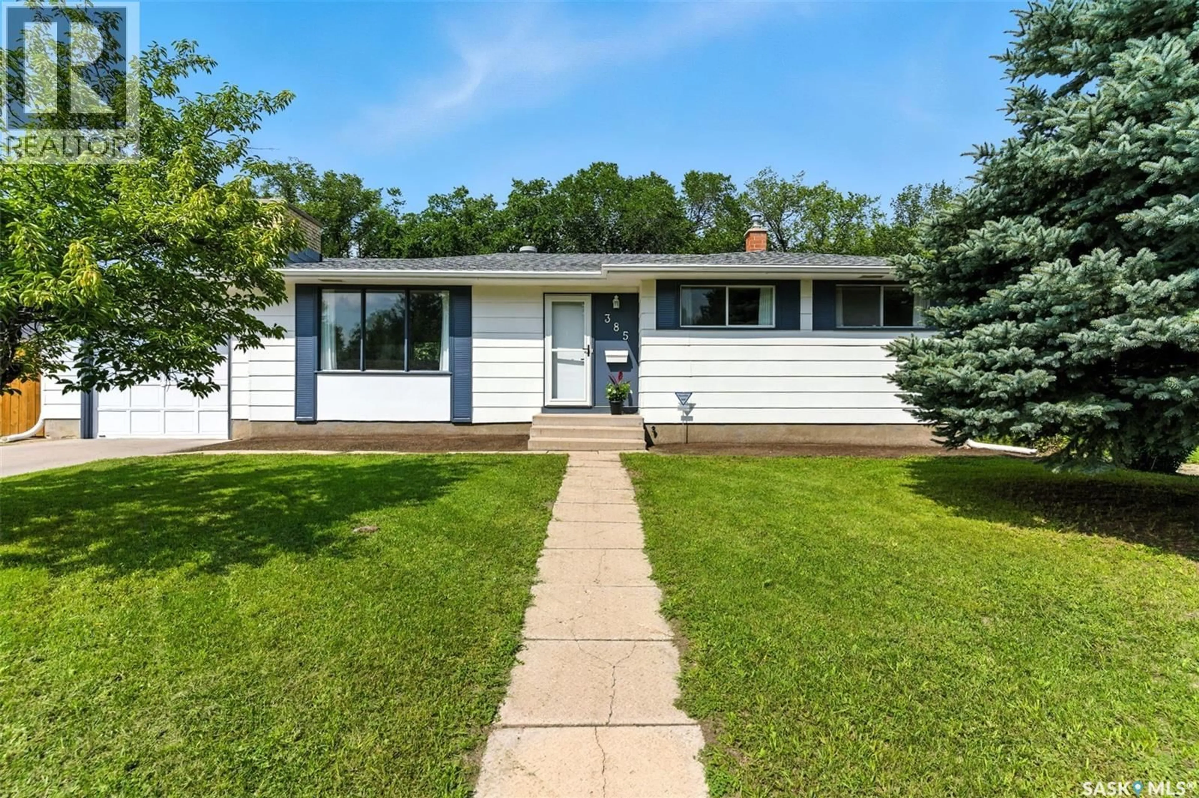 Home with vinyl exterior material, street for 385 BIRCH CRESCENT, Saskatoon Saskatchewan S7N2M6