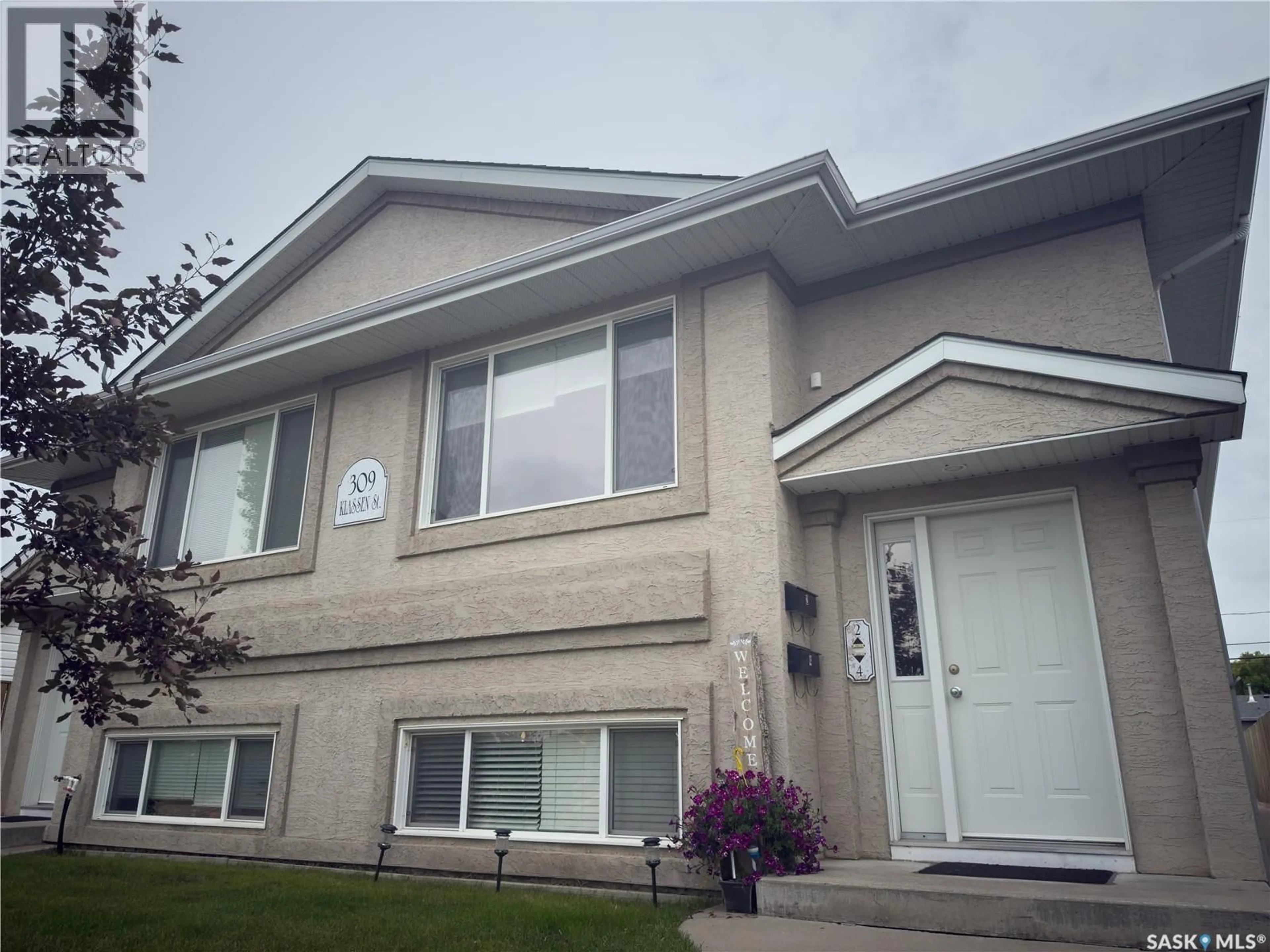 Home with vinyl exterior material, street for 309 KLASSEN STREET, Warman Saskatchewan S0K4S0