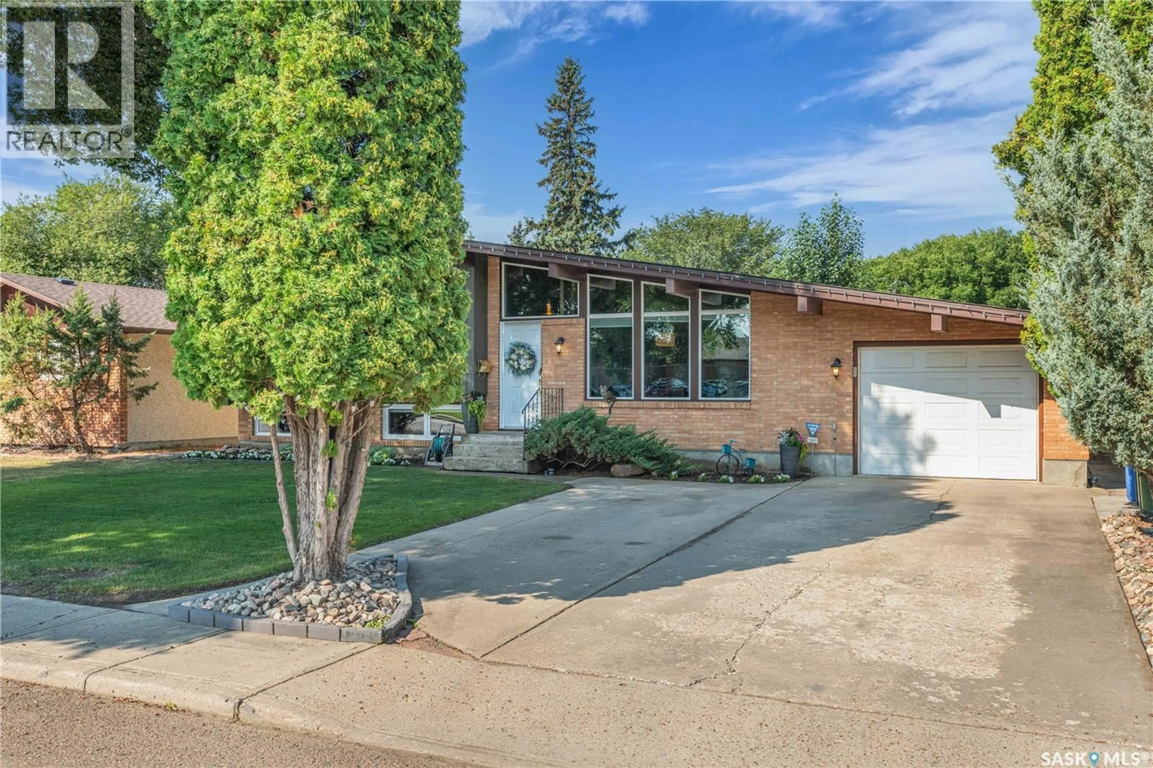 Home with brick exterior material, street for 2031 97TH STREET, North Battleford Saskatchewan S9A0L2
