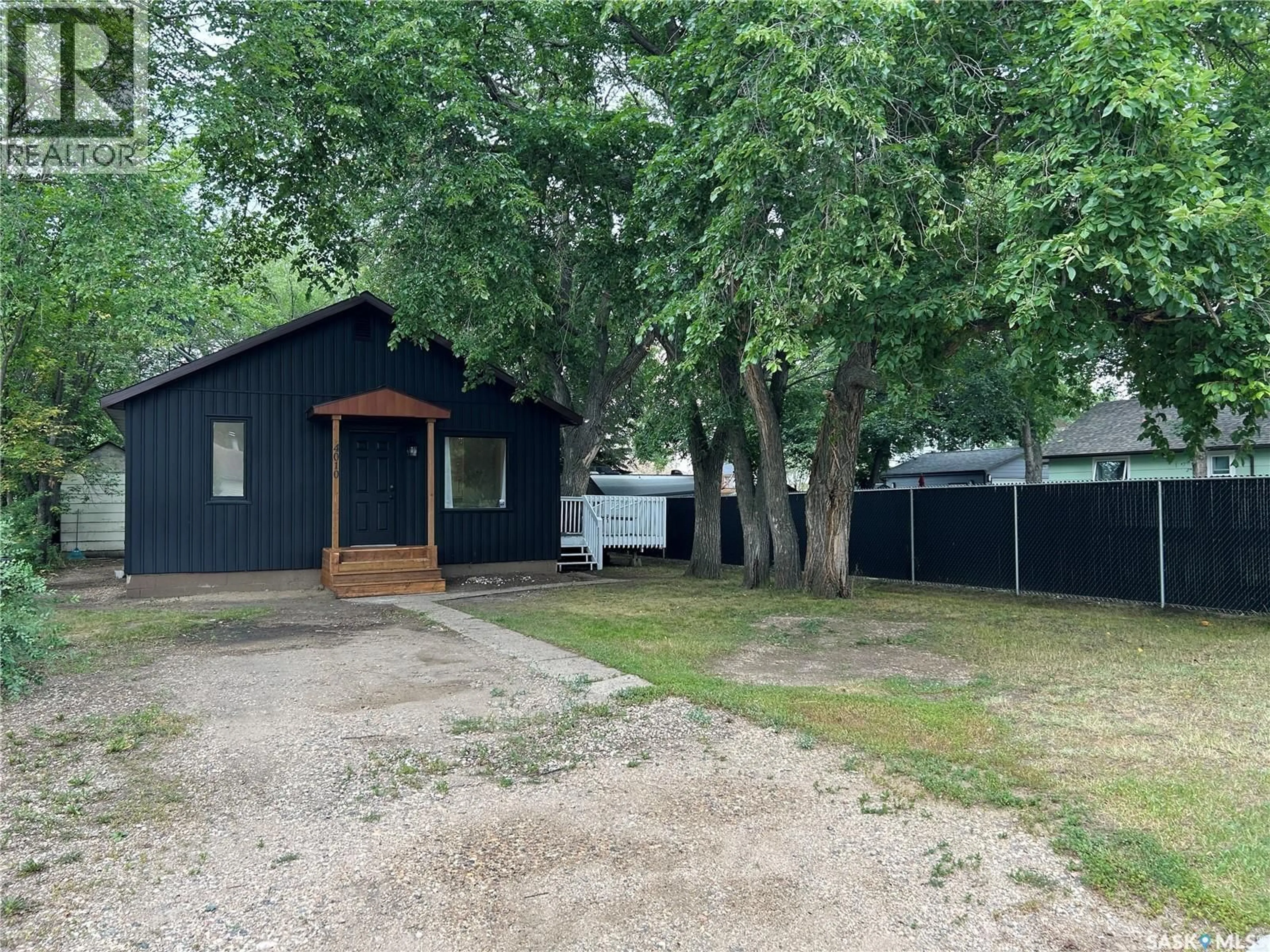 A pic from outside/outdoor area/front of a property/back of a property/a pic from drone, street for 4010 5TH STREET, Rosthern Saskatchewan S0K3R0