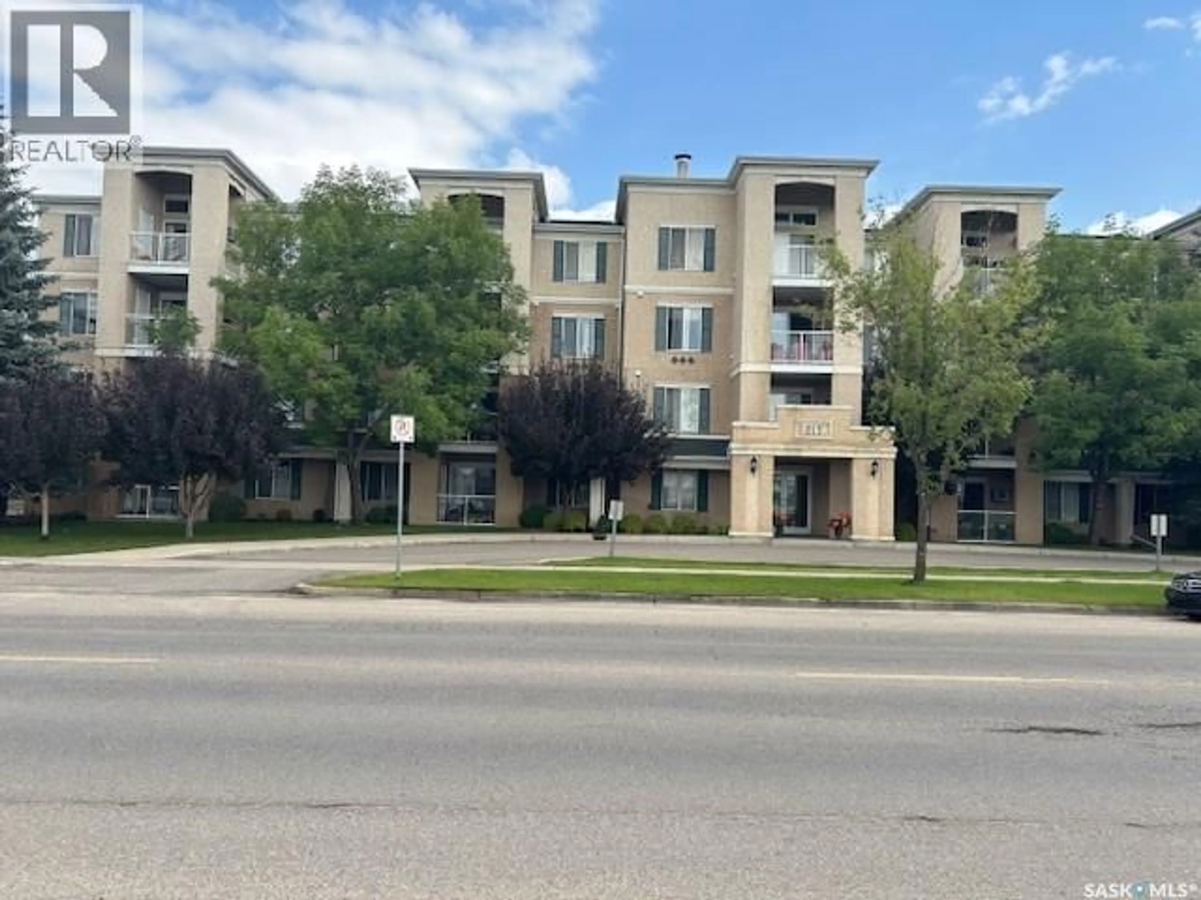 A pic from outside/outdoor area/front of a property/back of a property/a pic from drone, street for 215 - 301 LOWE ROAD, Saskatoon Saskatchewan S7S1N1