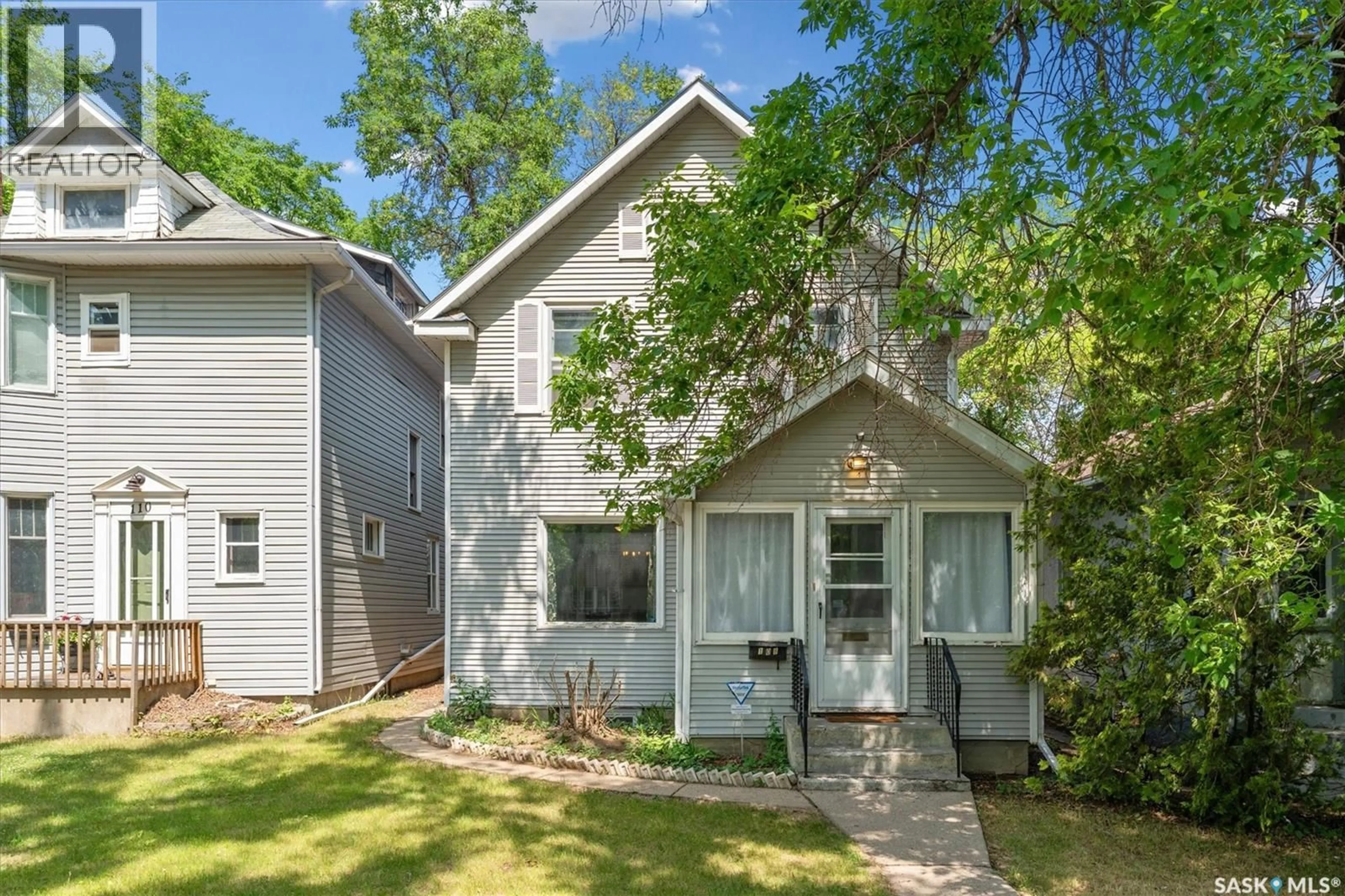 Home with vinyl exterior material, street for 108 31ST STREET, Saskatoon Saskatchewan S7L0P5
