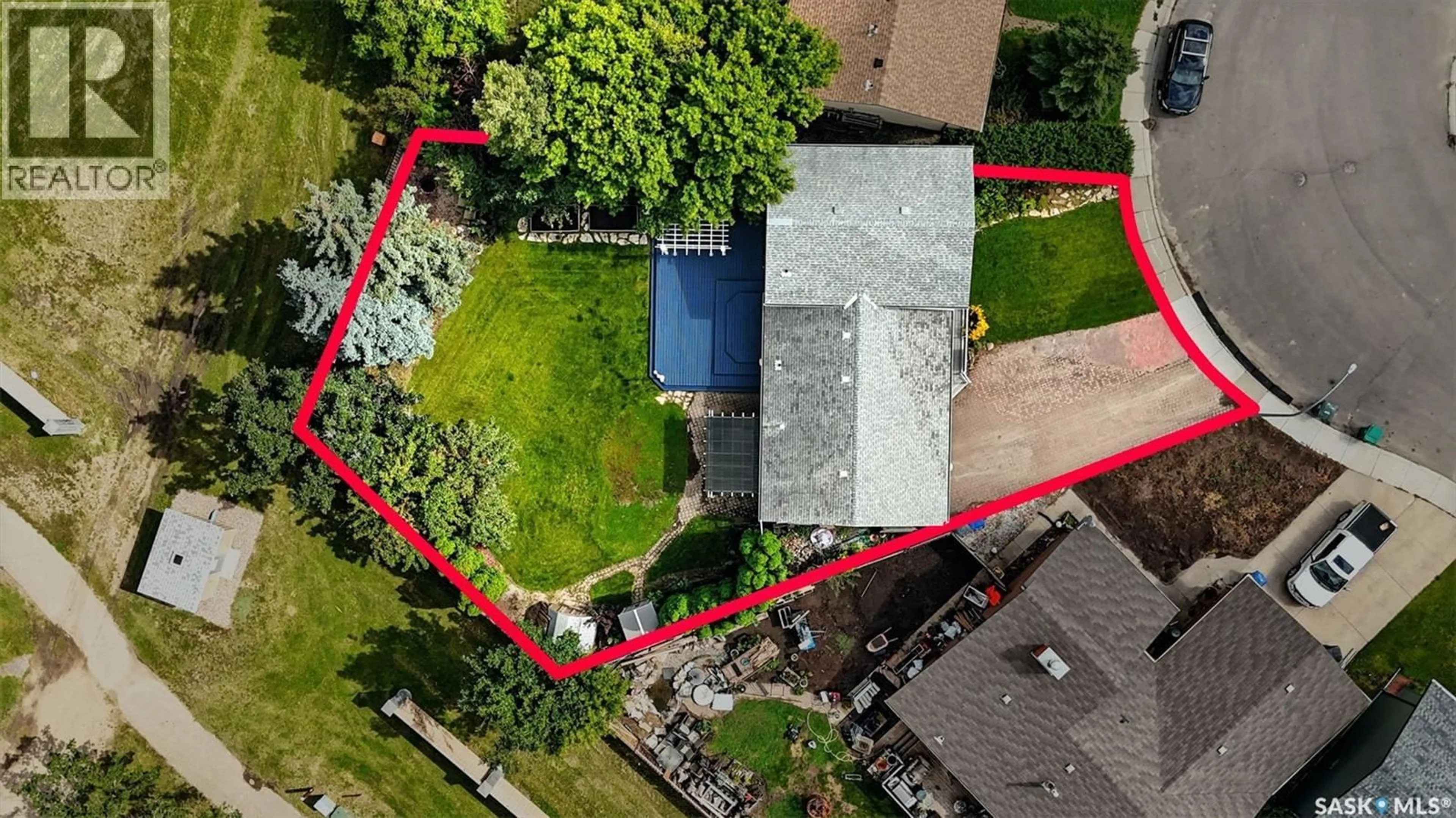 A pic from outside/outdoor area/front of a property/back of a property/a pic from drone, street for 134 DELAYEN CRESCENT, Saskatoon Saskatchewan S7N2V6