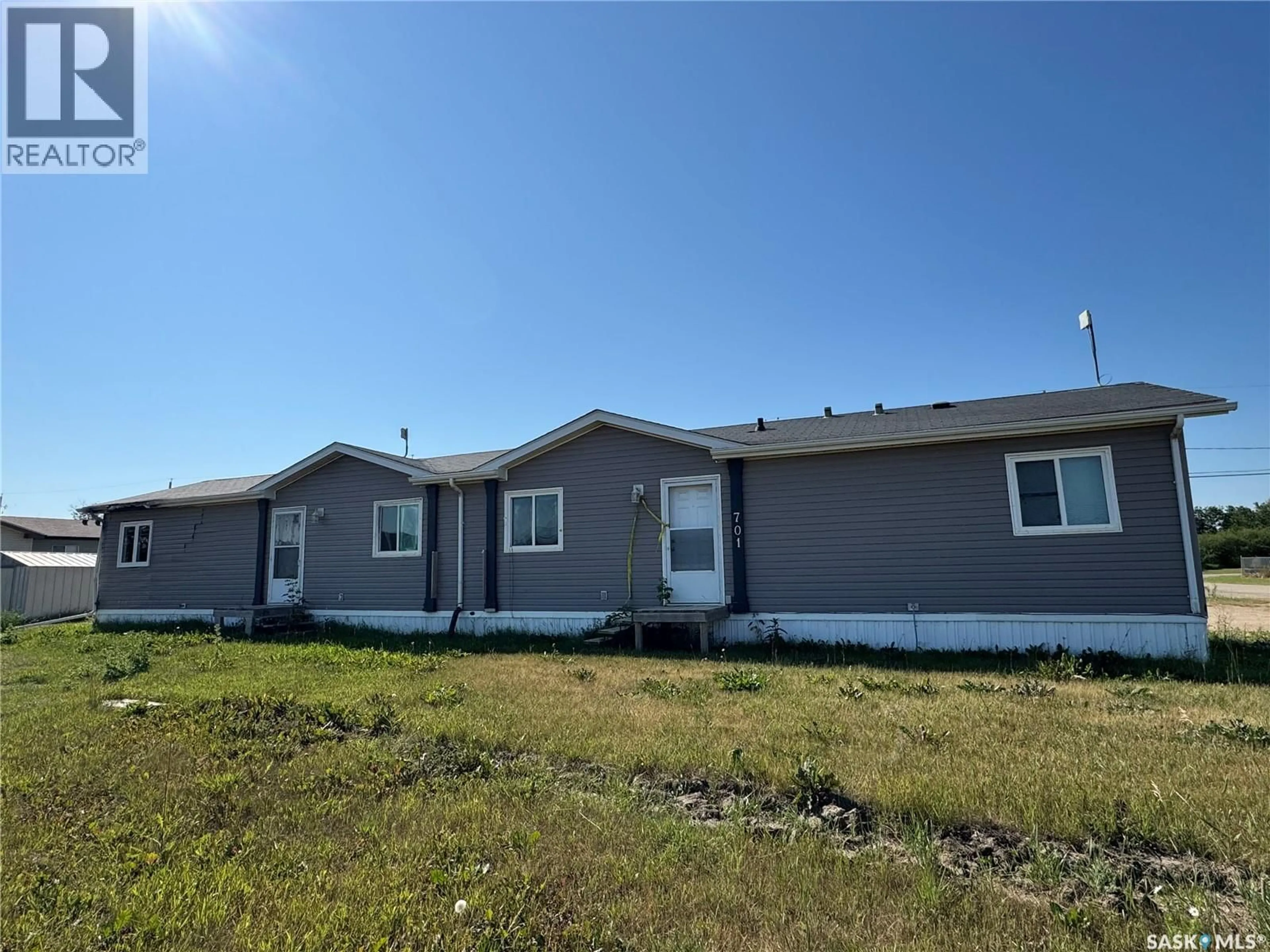 Home with vinyl exterior material, building for 701 2ND AVENUE, Shellbrook Saskatchewan S0J2E0