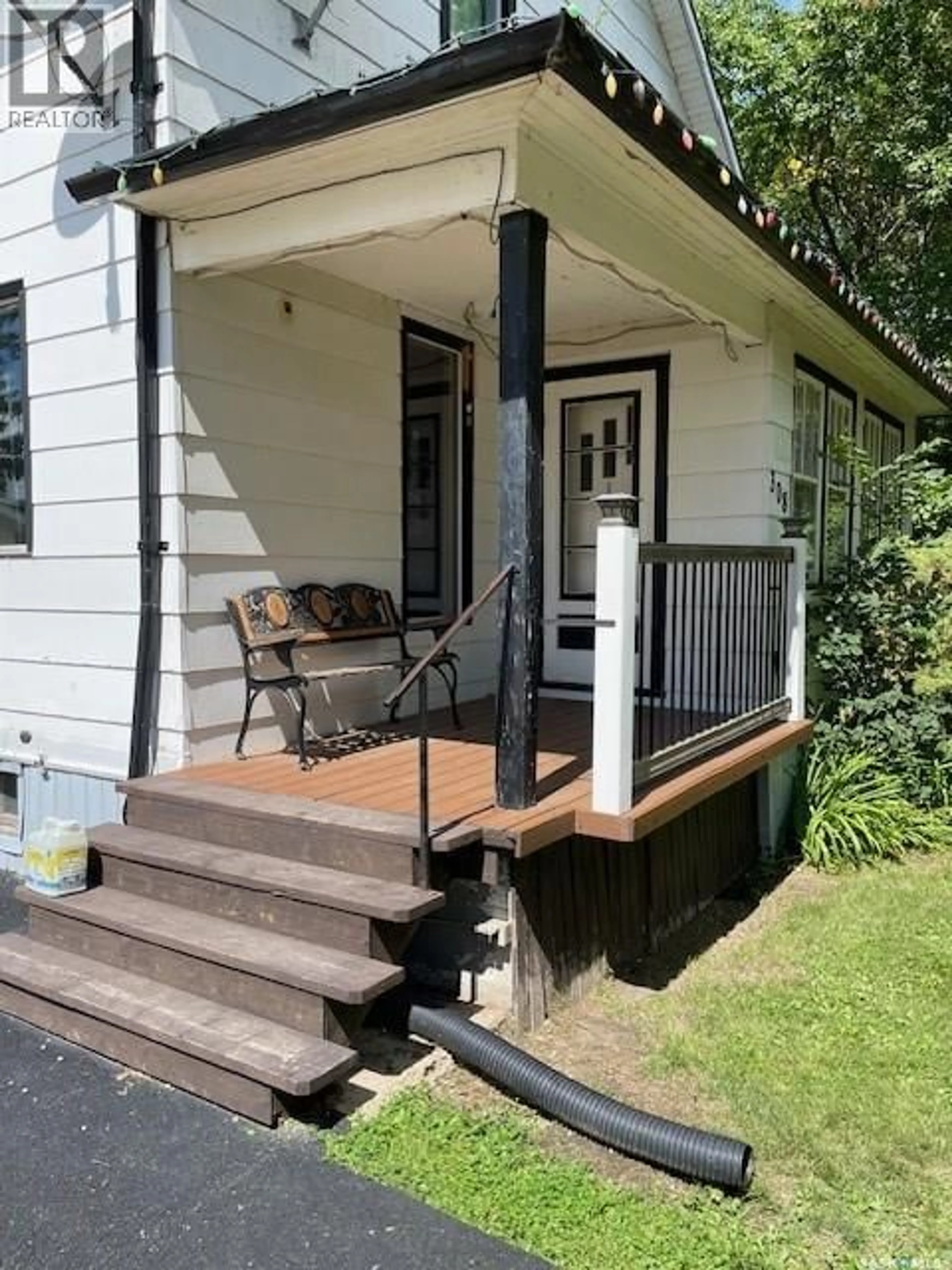 Home with vinyl exterior material, street for 308 1ST STREET, Carlyle Saskatchewan S0C0R0