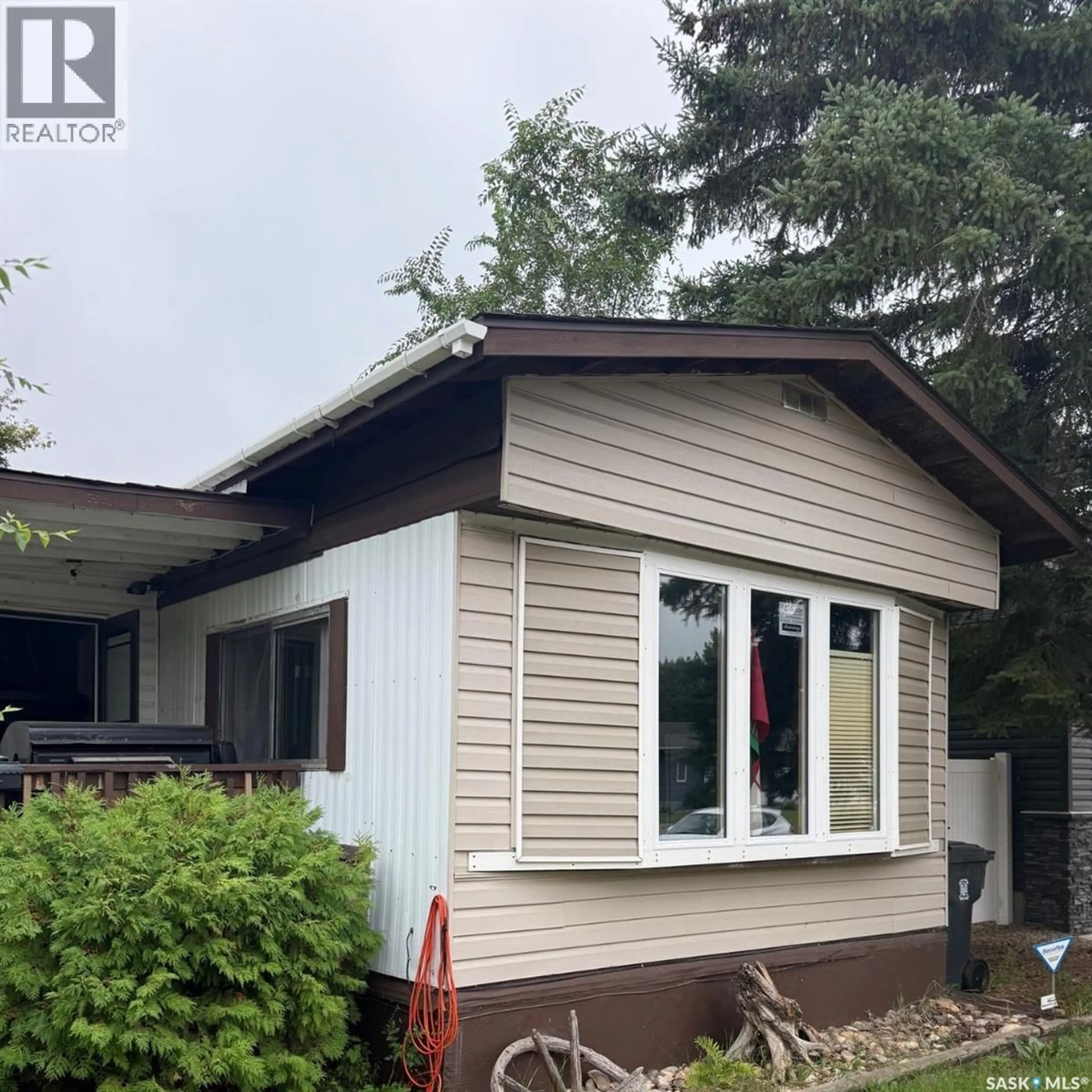 Home with vinyl exterior material, street for 250 30TH STREET, Battleford Saskatchewan S0M0E0