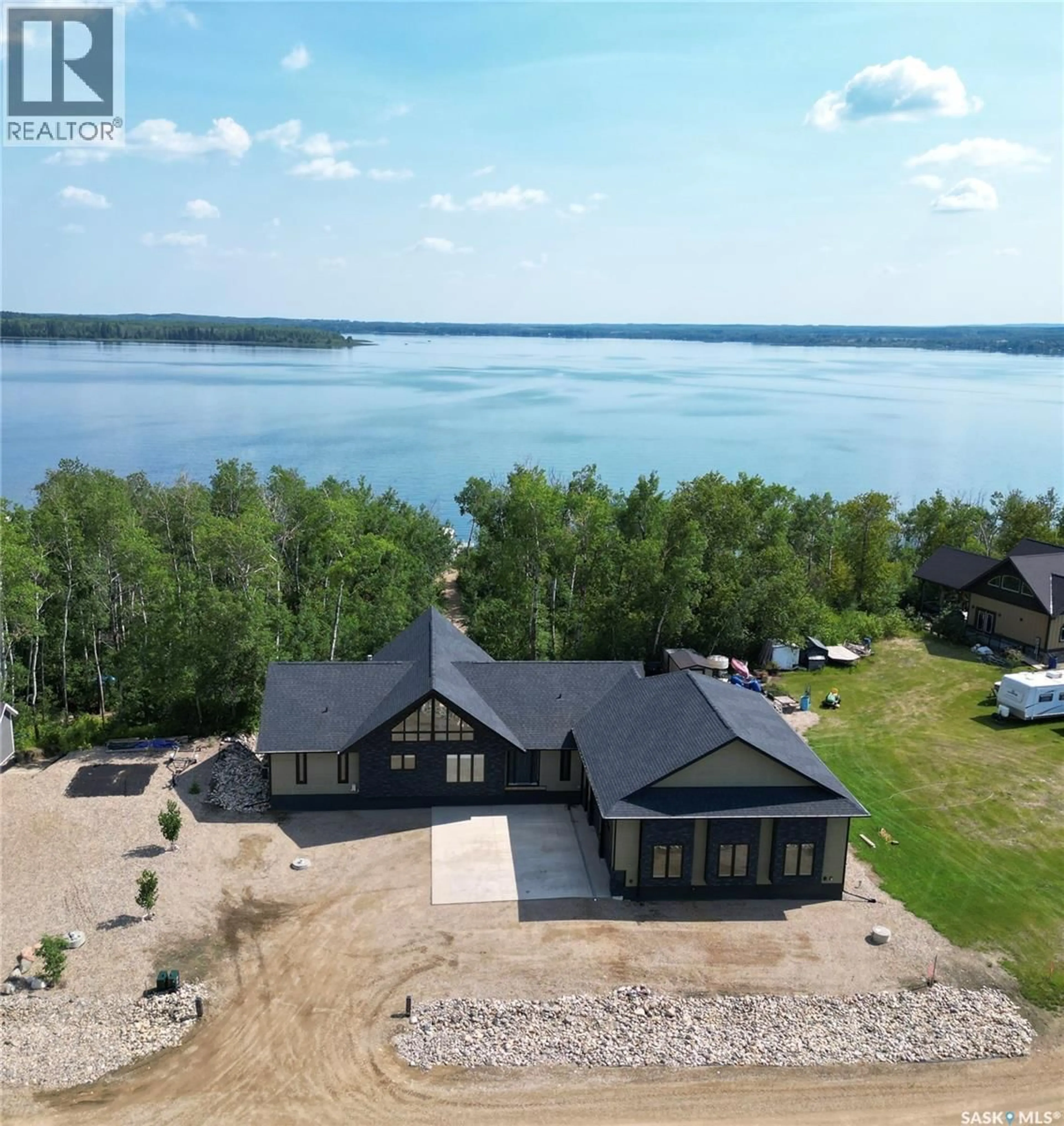 A pic from outside/outdoor area/front of a property/back of a property/a pic from drone, water/lake/river/ocean view for 2 DERBY LANE, Big Shell Saskatchewan S0J2G0