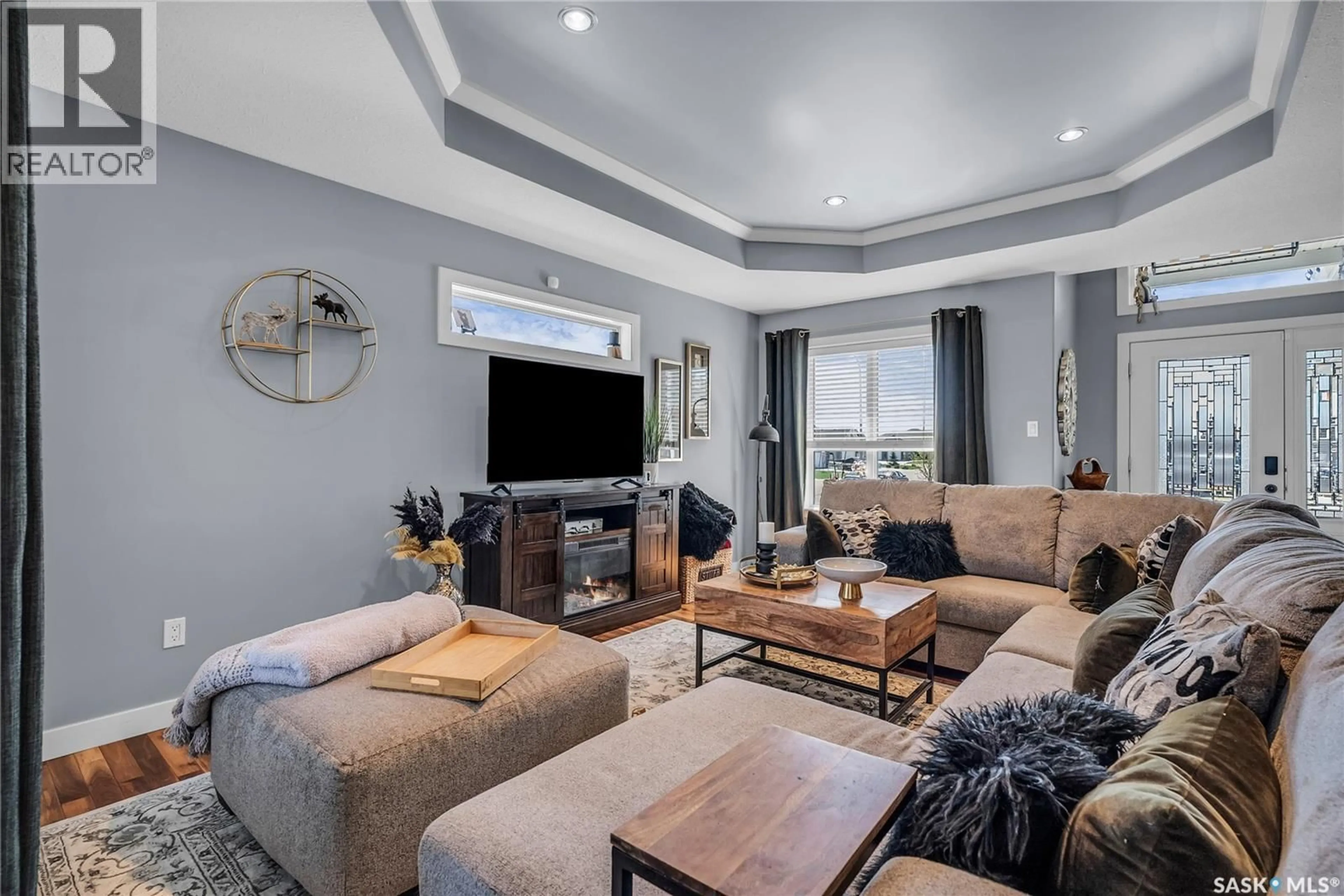Living room with furniture, unknown for 318 LAKERIDGE DRIVE, Warman Saskatchewan S0K0A1