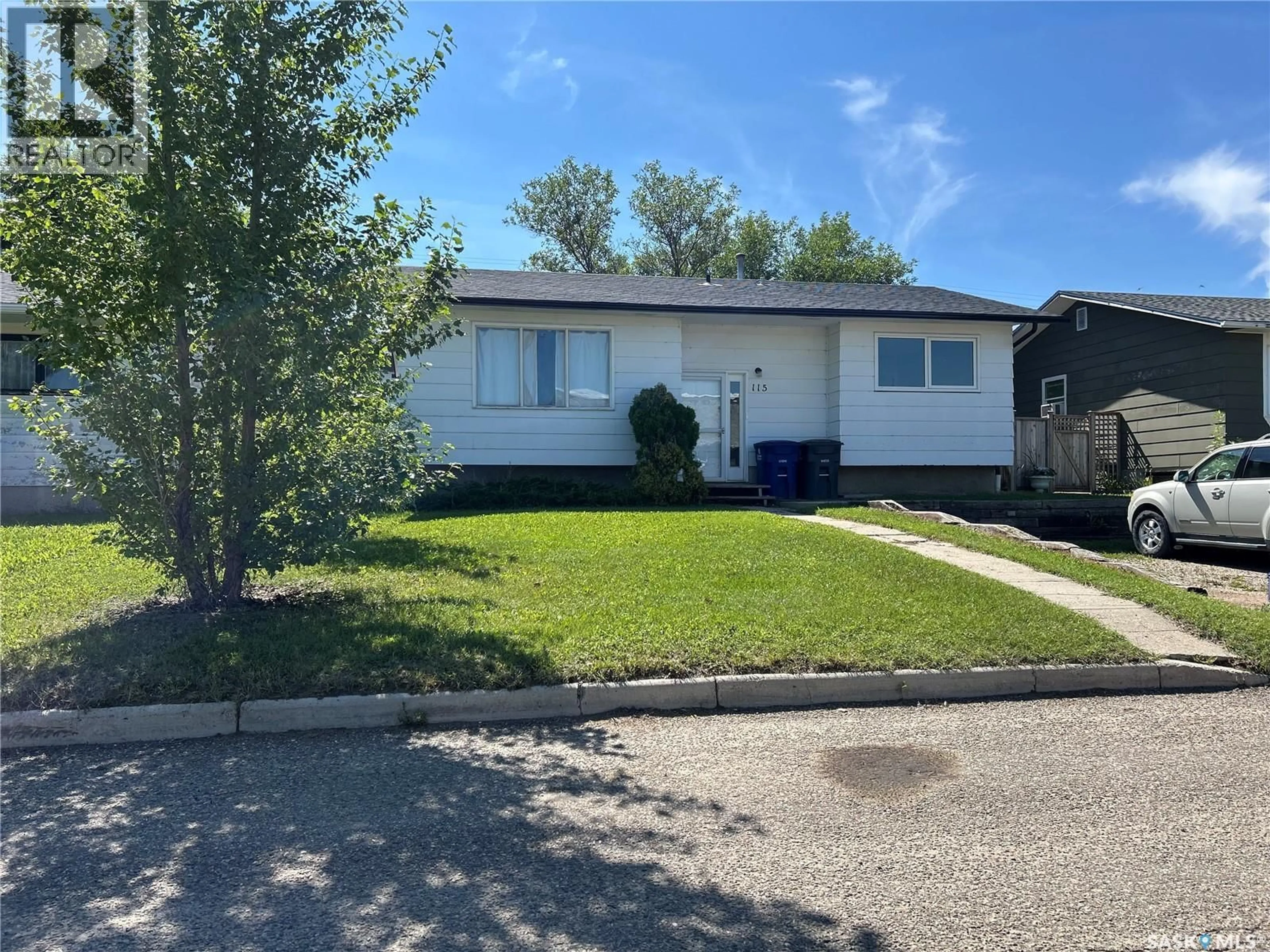 Home with vinyl exterior material, street for 115 ATLANTIC AVENUE, Kerrobert Saskatchewan S0L1R0