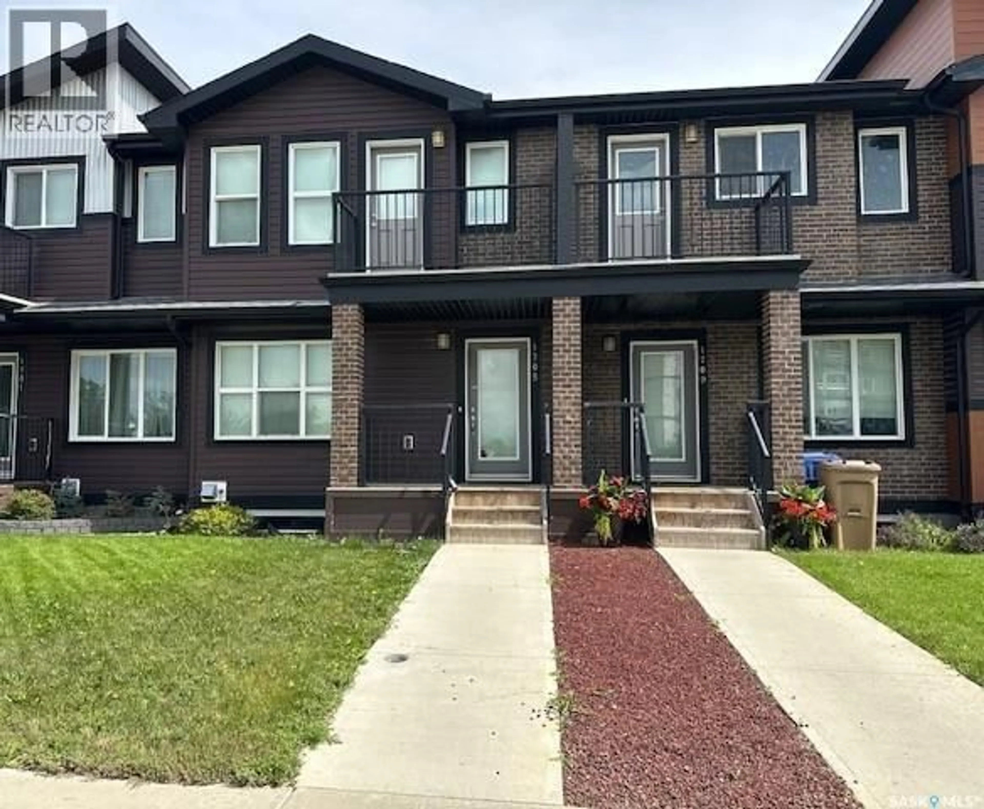 Home with brick exterior material, street for 1705 RED SPRING STREET, Regina Saskatchewan S4Y0G4