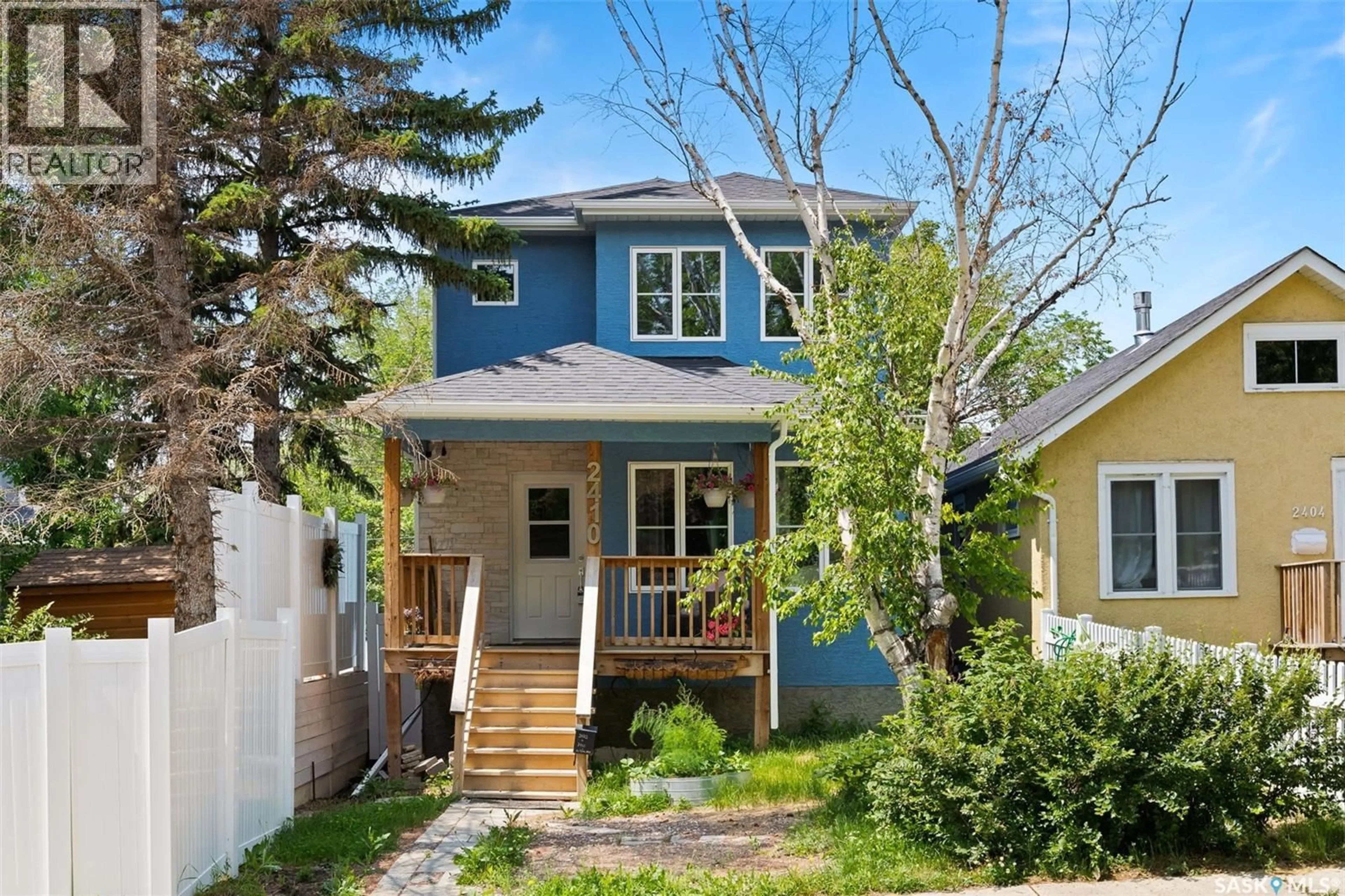 Home with vinyl exterior material, street for 2410 ATHOL STREET, Regina Saskatchewan S4T3G5