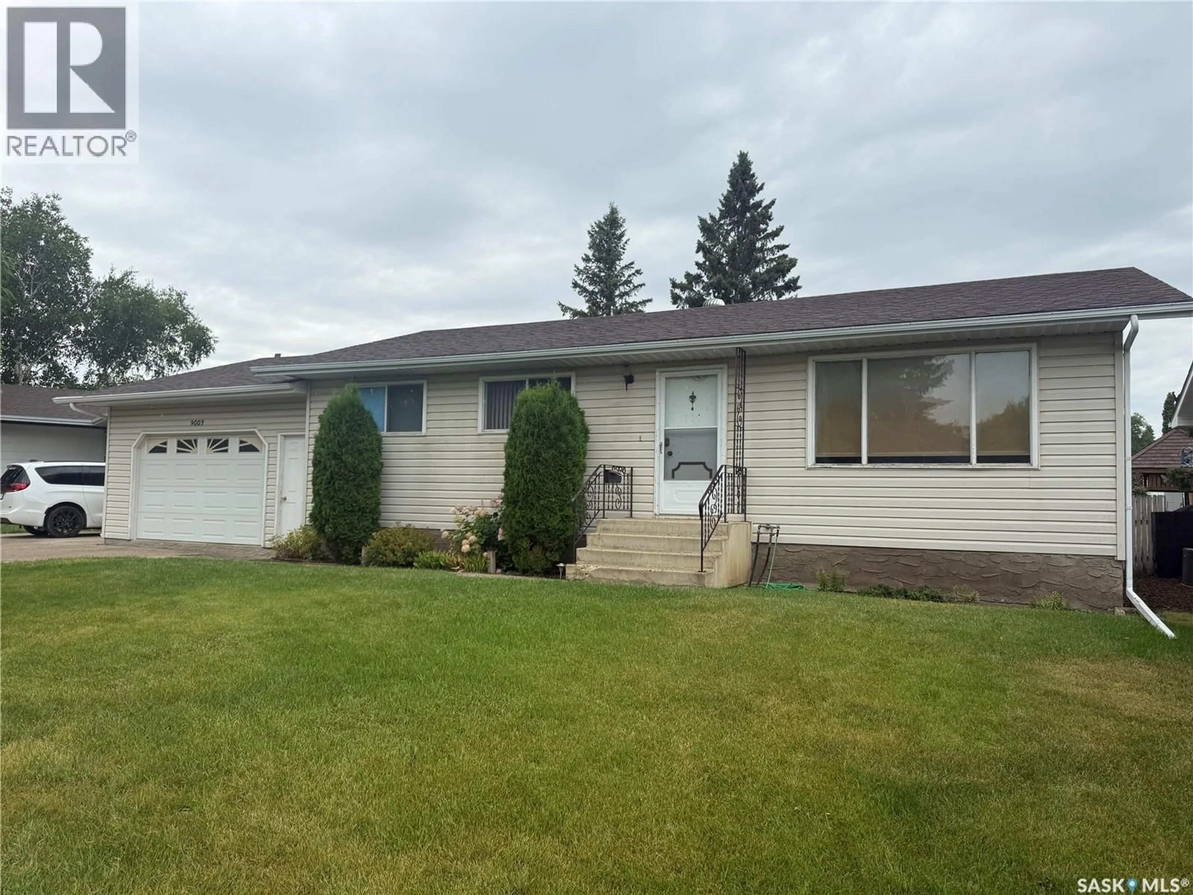 Home with vinyl exterior material, street for 9003 ABBOTT AVENUE, North Battleford Saskatchewan S9A3E8