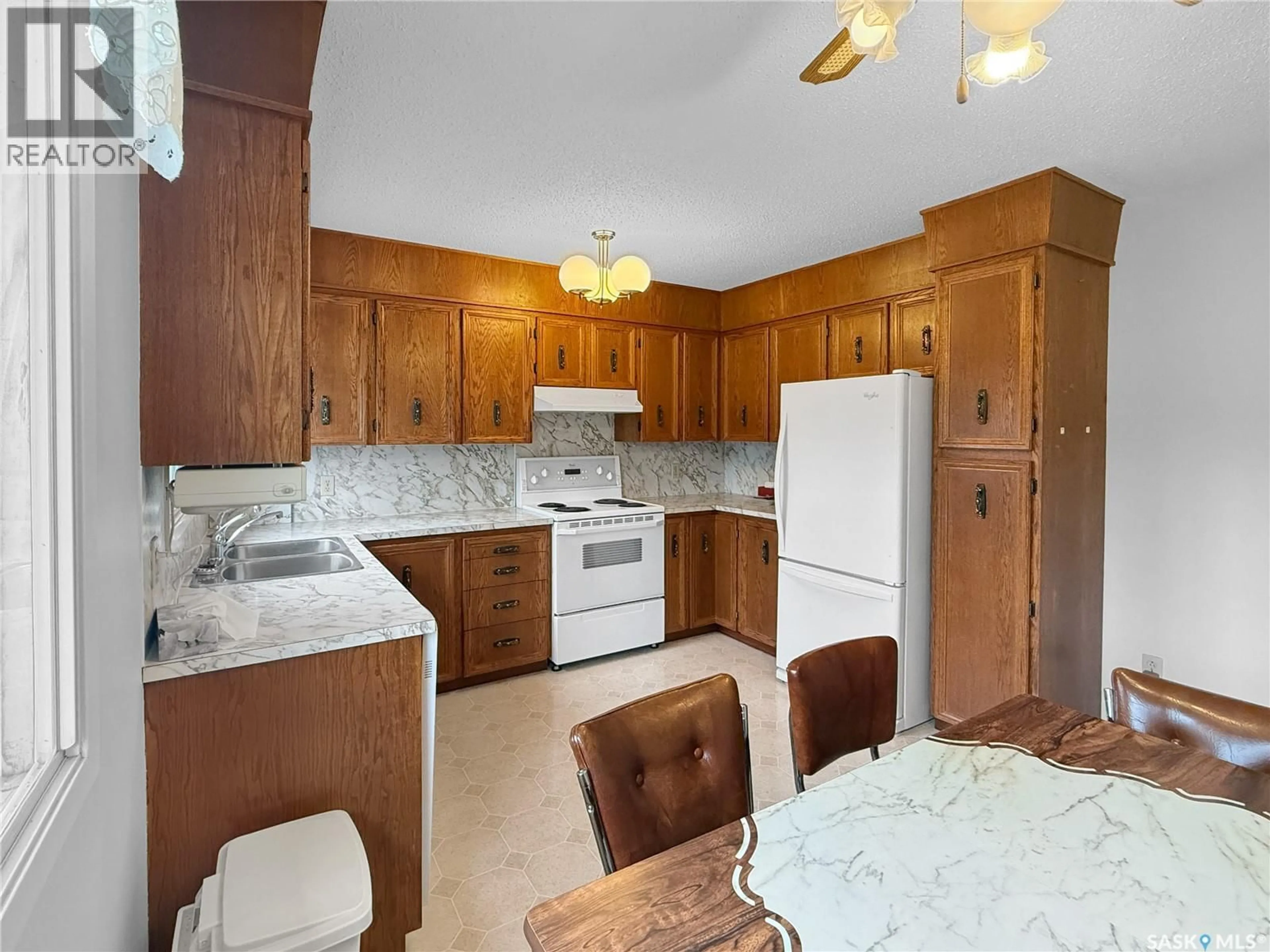 Standard kitchen, ceramic/tile floor for 9003 ABBOTT AVENUE, North Battleford Saskatchewan S9A3E8
