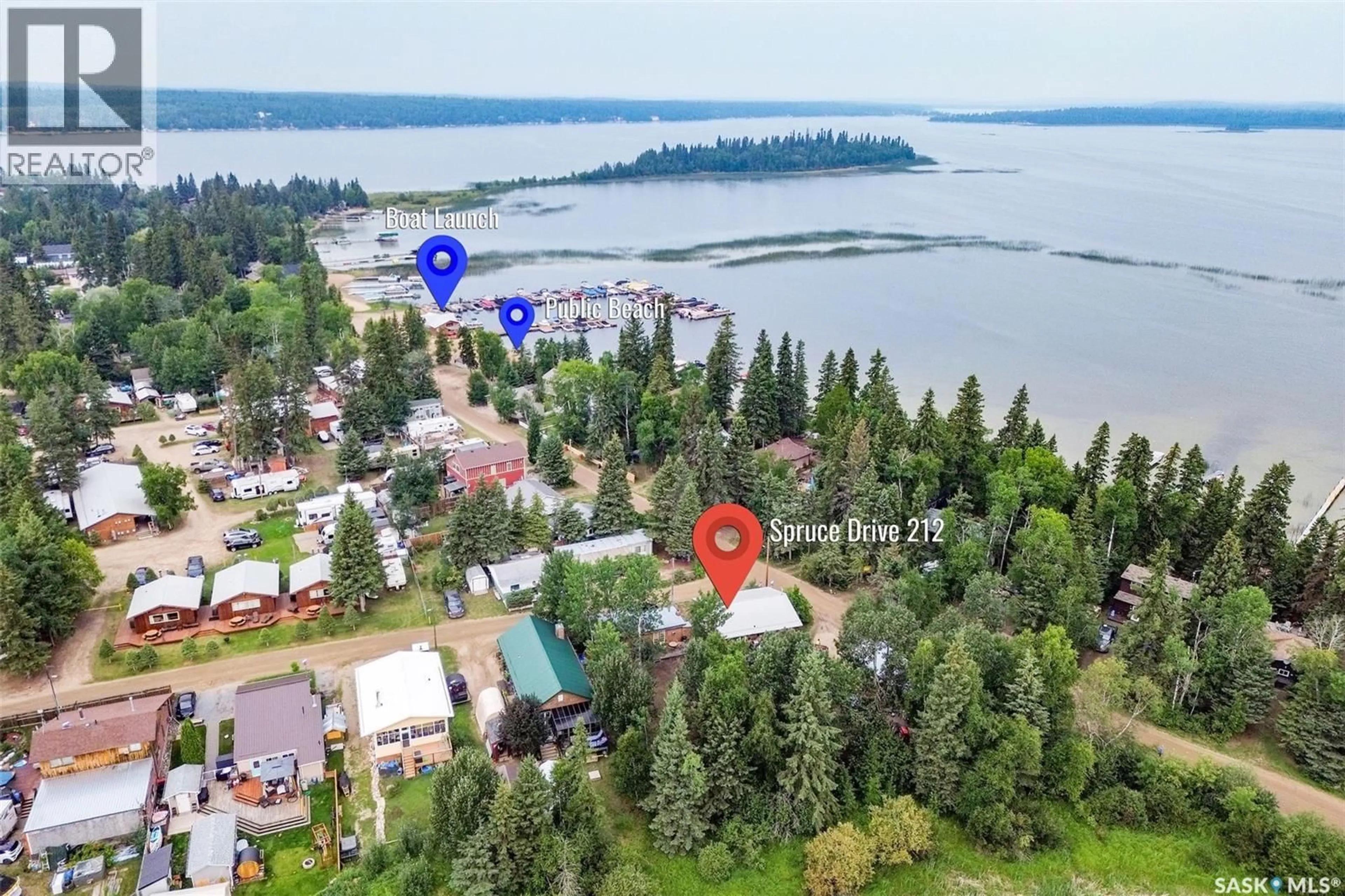 A pic from outside/outdoor area/front of a property/back of a property/a pic from drone, water/lake/river/ocean view for 212 SPRUCE DRIVE, Lakeland Rm No. 521 Saskatchewan S0J0N0