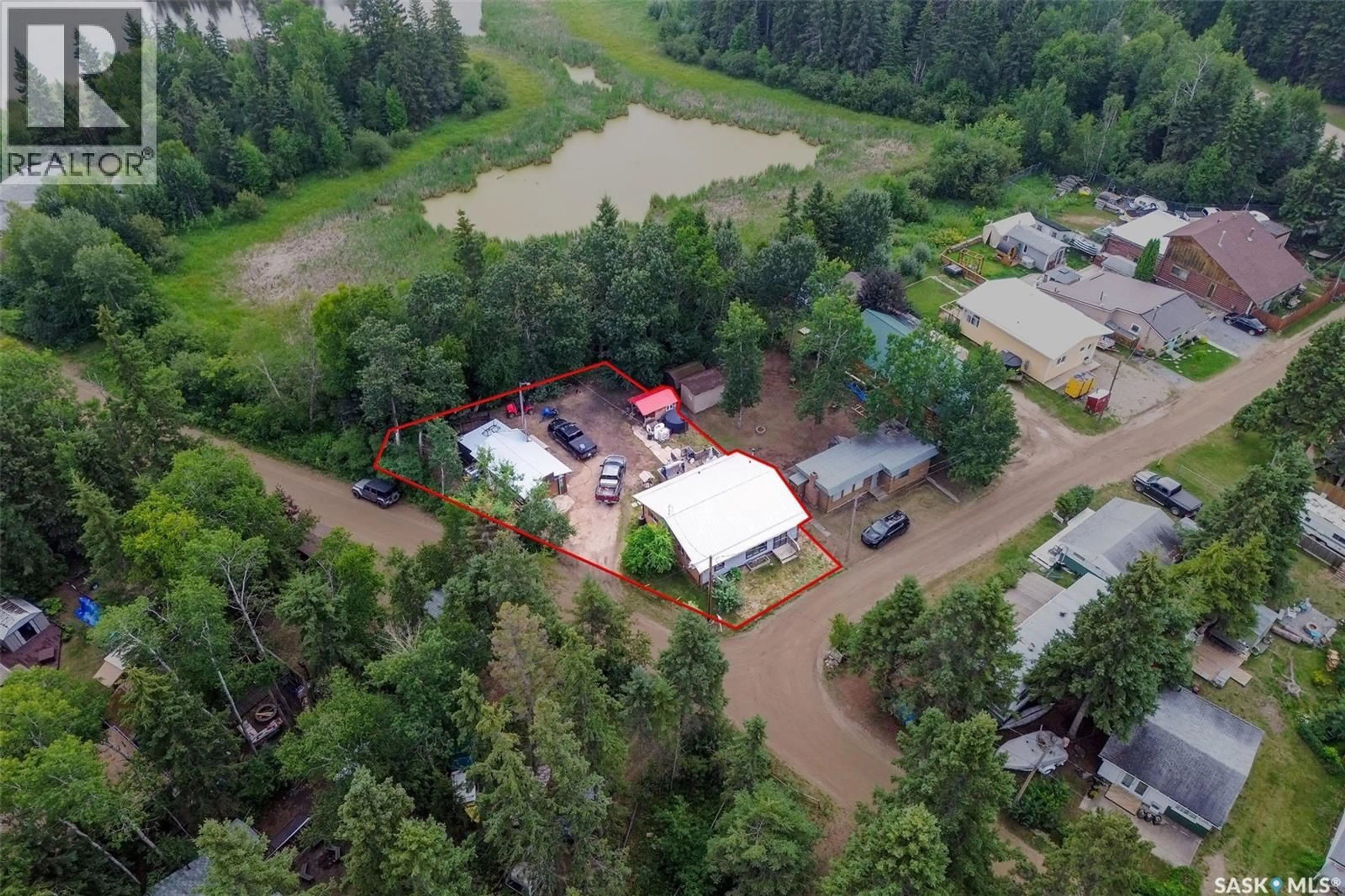 A pic from outside/outdoor area/front of a property/back of a property/a pic from drone, unknown for 212 SPRUCE DRIVE, Lakeland Rm No. 521 Saskatchewan S0J0N0