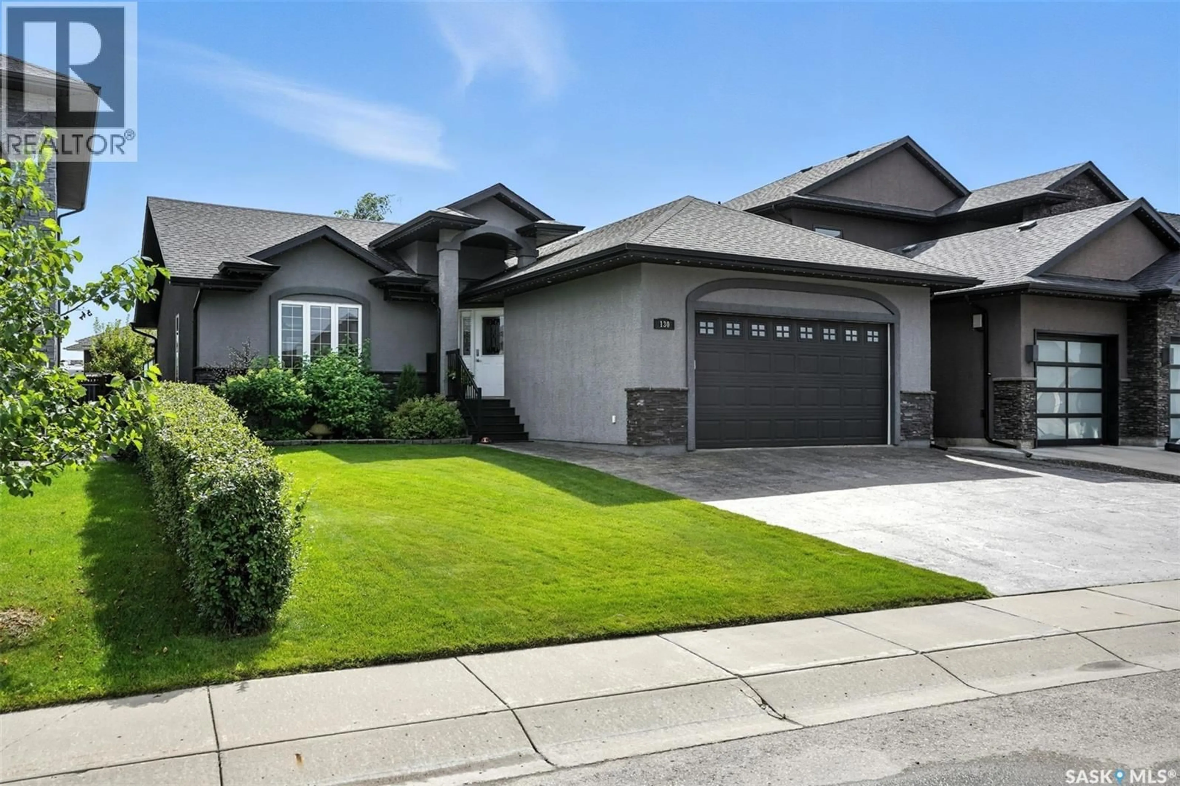 Home with vinyl exterior material, street for 130 ROY CRESCENT, Saskatoon Saskatchewan S7W0K9