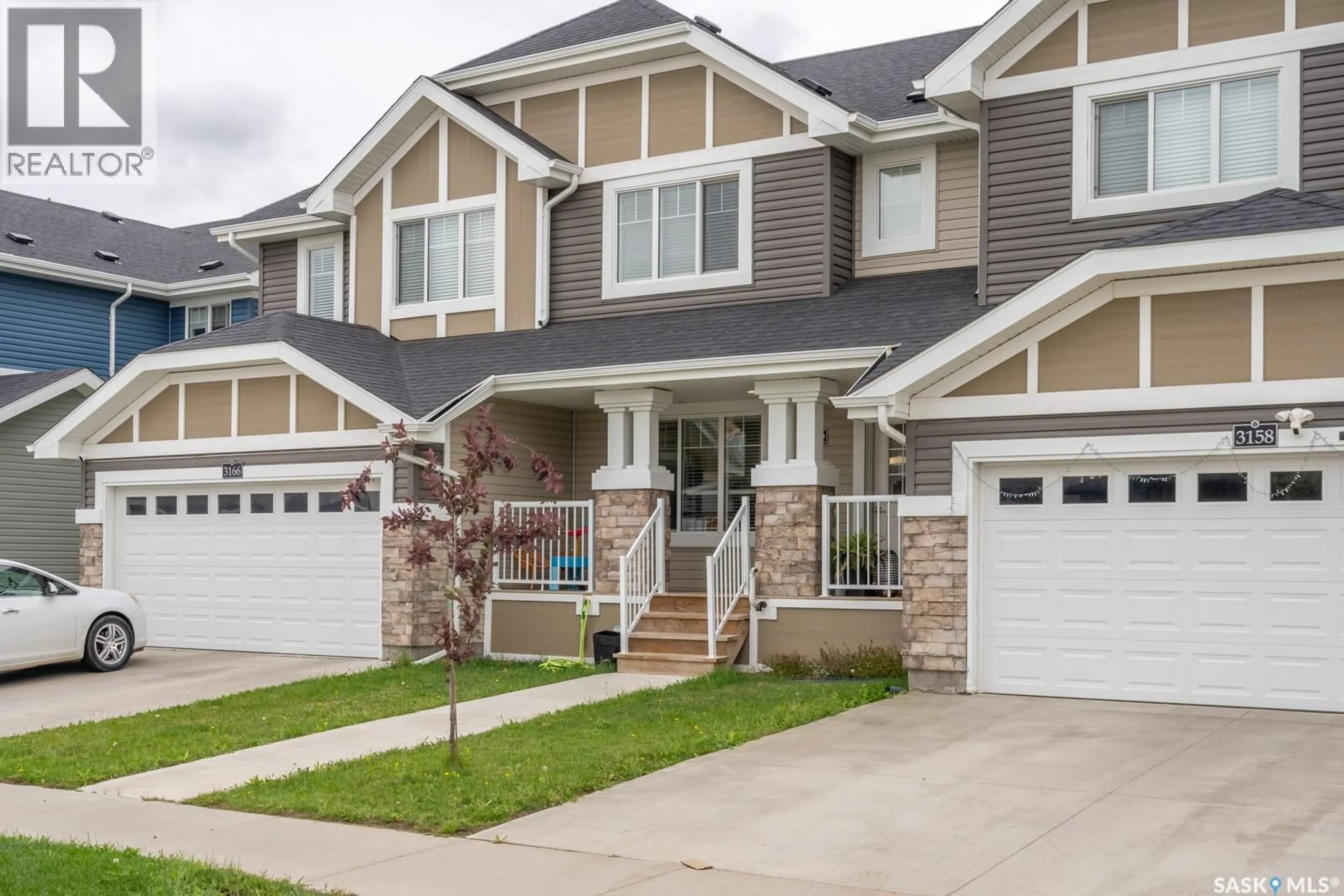 Home with vinyl exterior material, street for 3162 GREEN STONE ROAD, Regina Saskatchewan S4V3R8