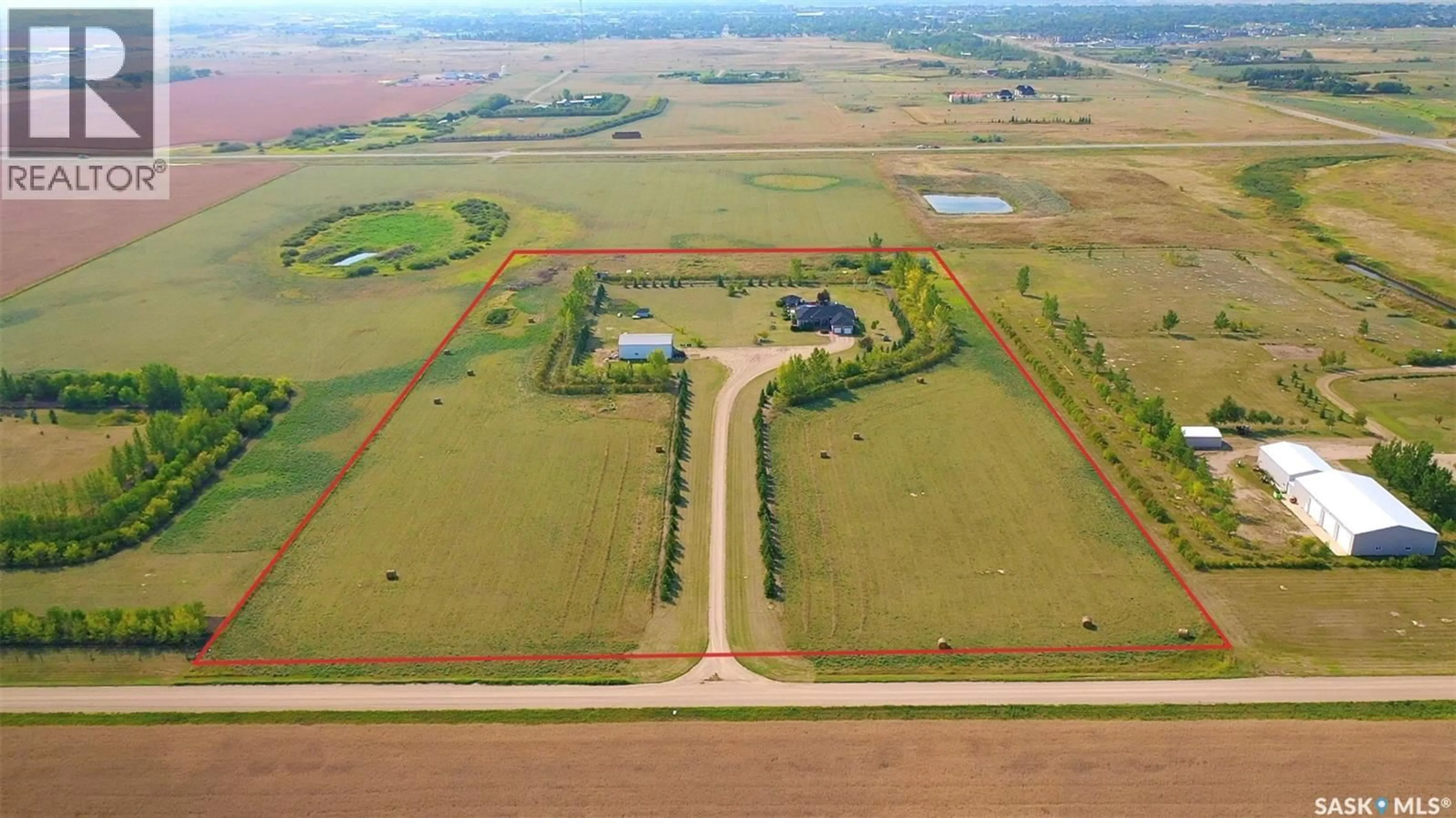 A pic from outside/outdoor area/front of a property/back of a property/a pic from drone, building for SEEMAN ACREAGE, Estevan Rm No. 5 Saskatchewan S4A2A5
