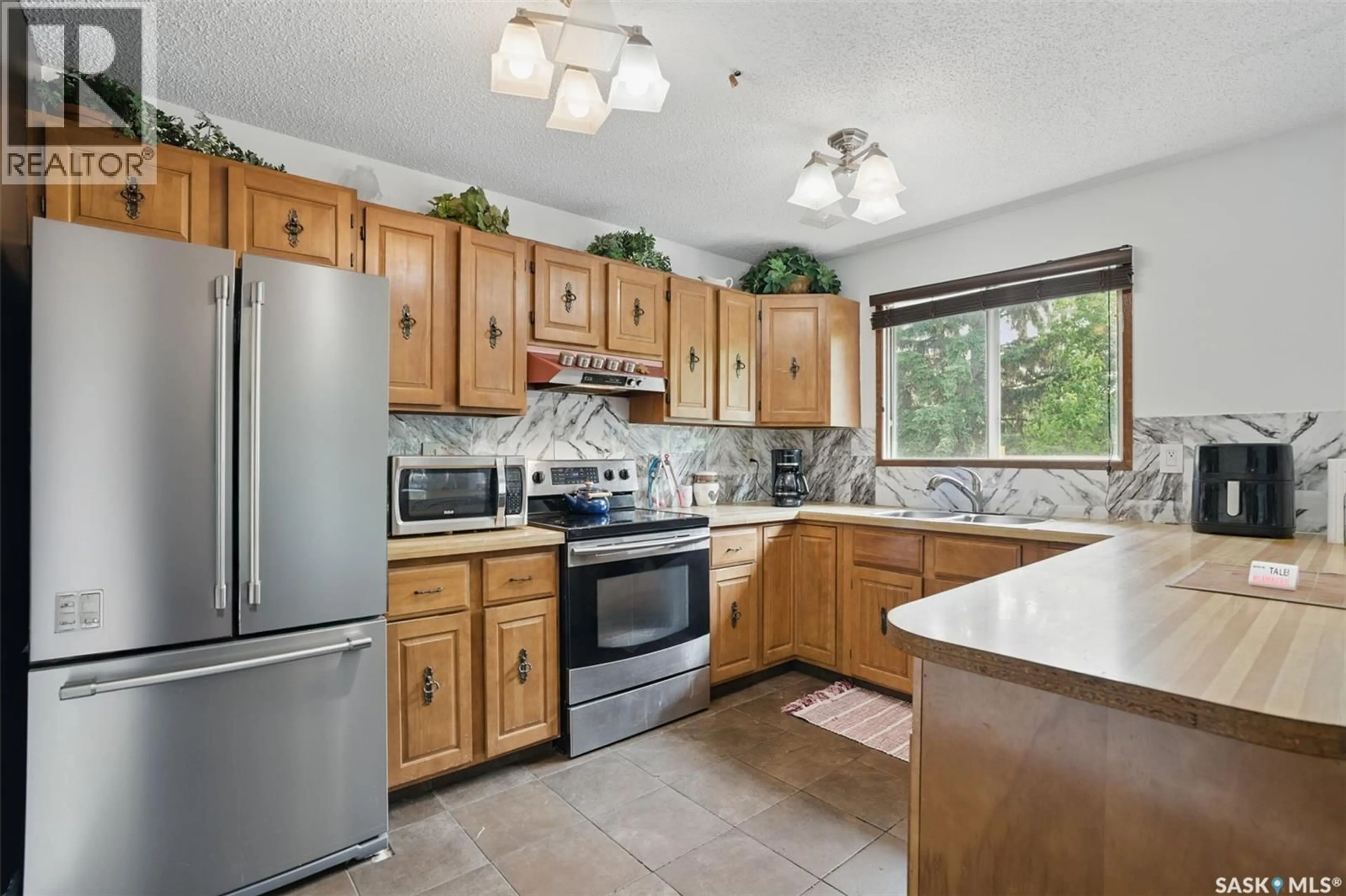 Standard kitchen, ceramic/tile floor for 745 GRID ROAD, Bruno Saskatchewan S0K0S0
