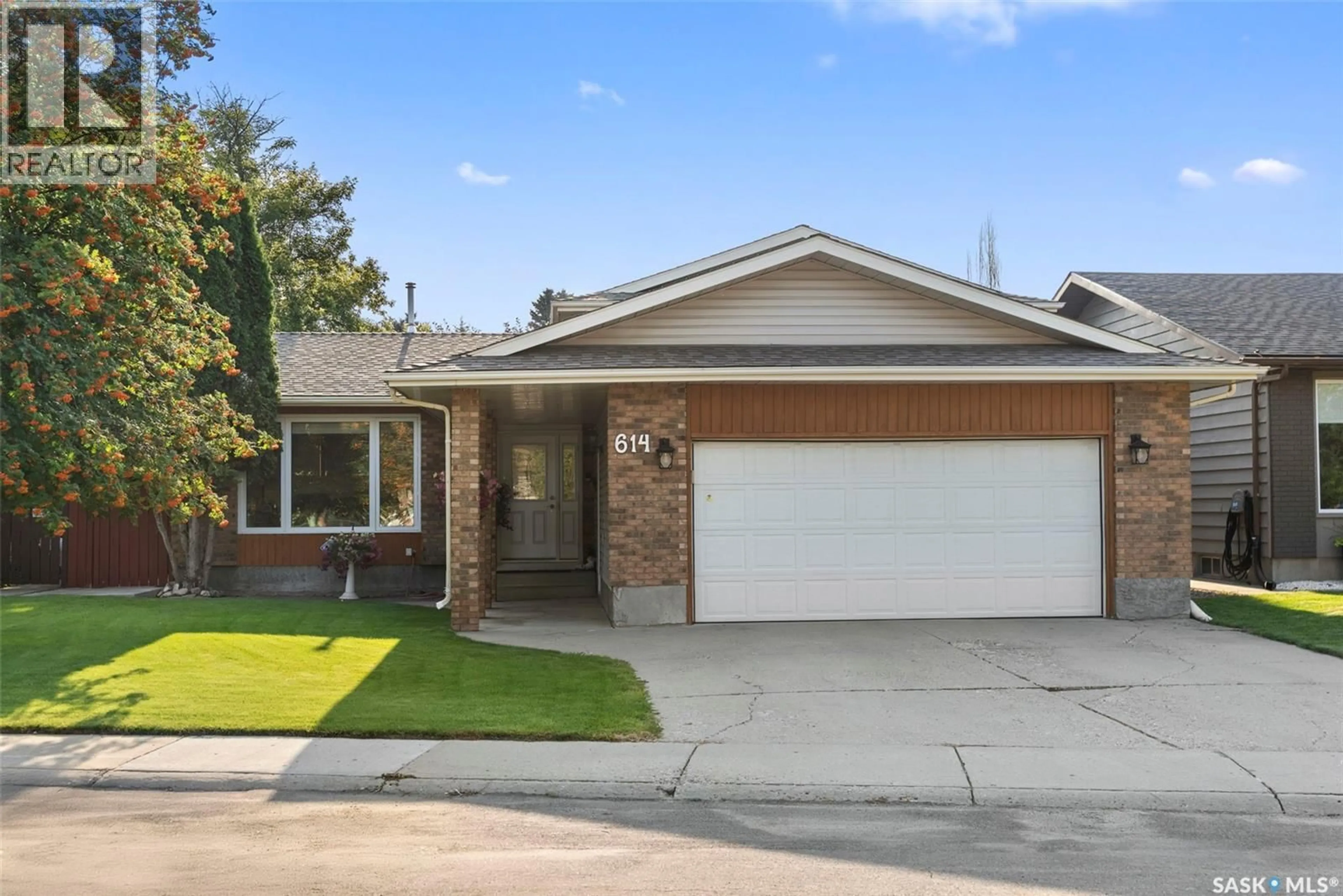 Home with brick exterior material, street for 614 COSTIGAN WAY, Saskatoon Saskatchewan S7J3R2