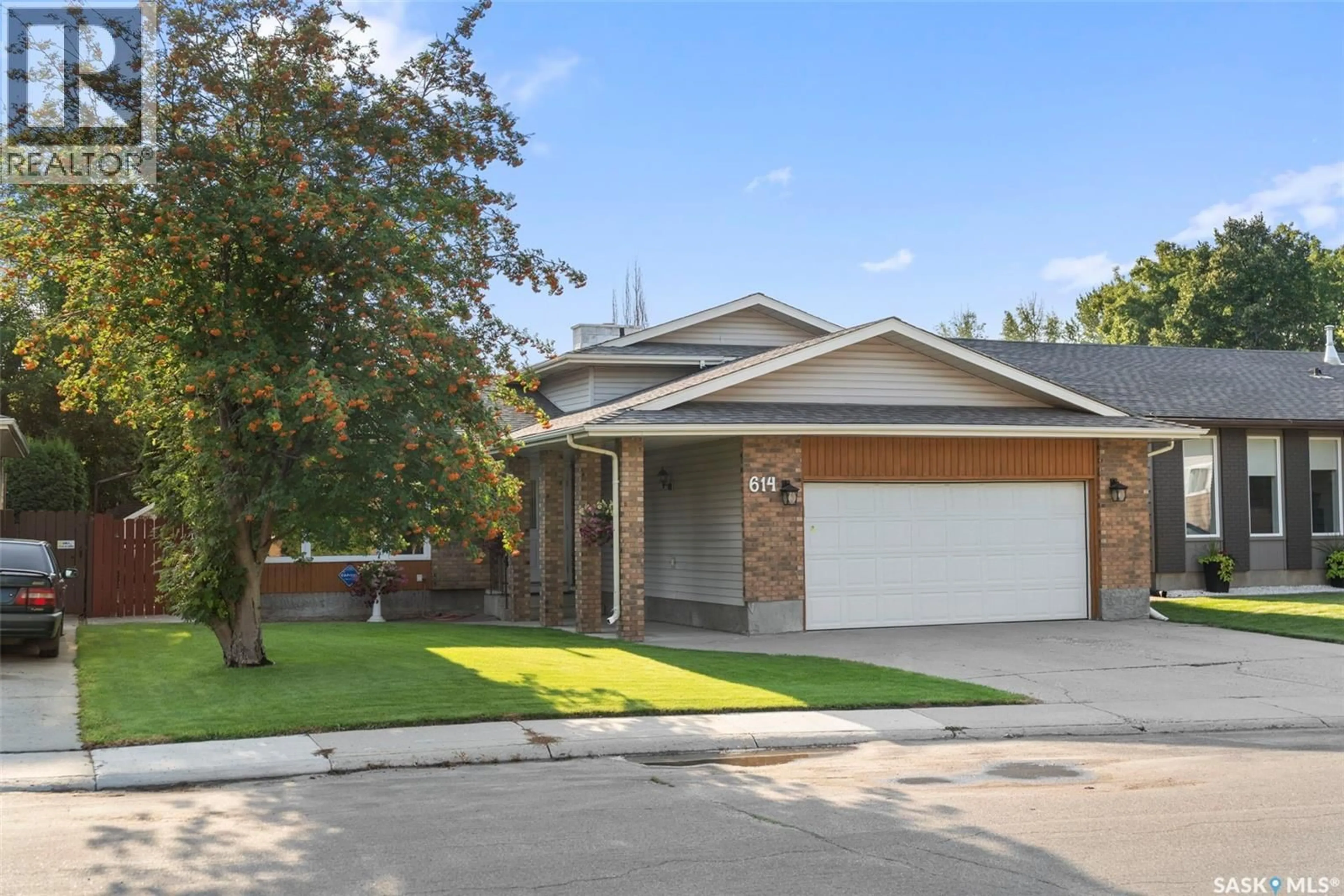 Home with brick exterior material, street for 614 COSTIGAN WAY, Saskatoon Saskatchewan S7J3R2