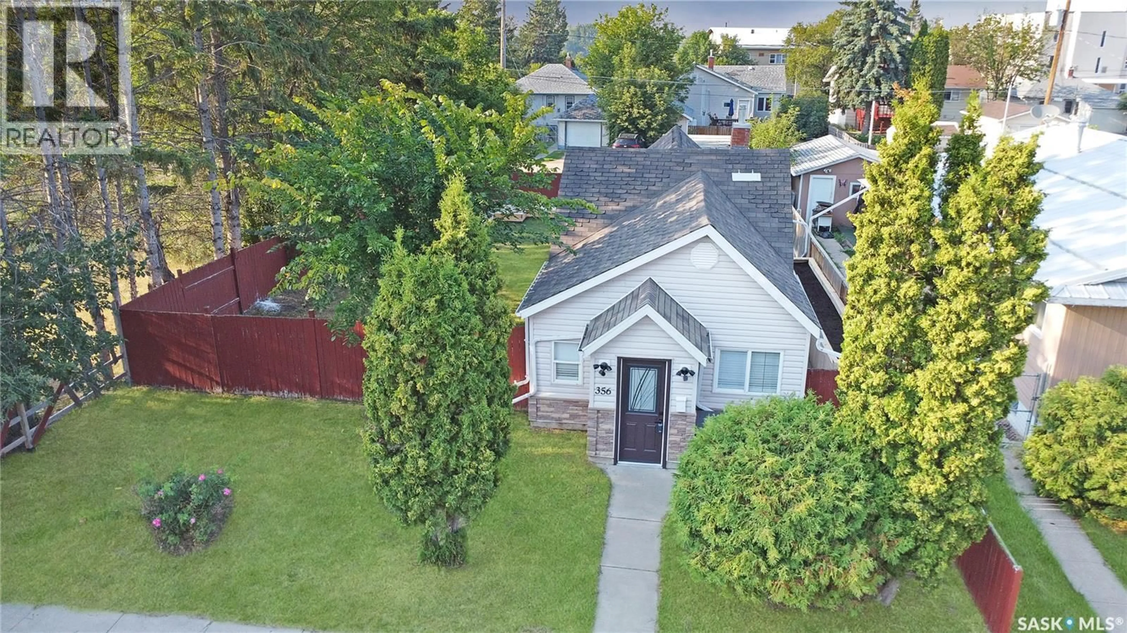 A pic from outside/outdoor area/front of a property/back of a property/a pic from drone, street for 356 13TH STREET, Prince Albert Saskatchewan S6V3G3