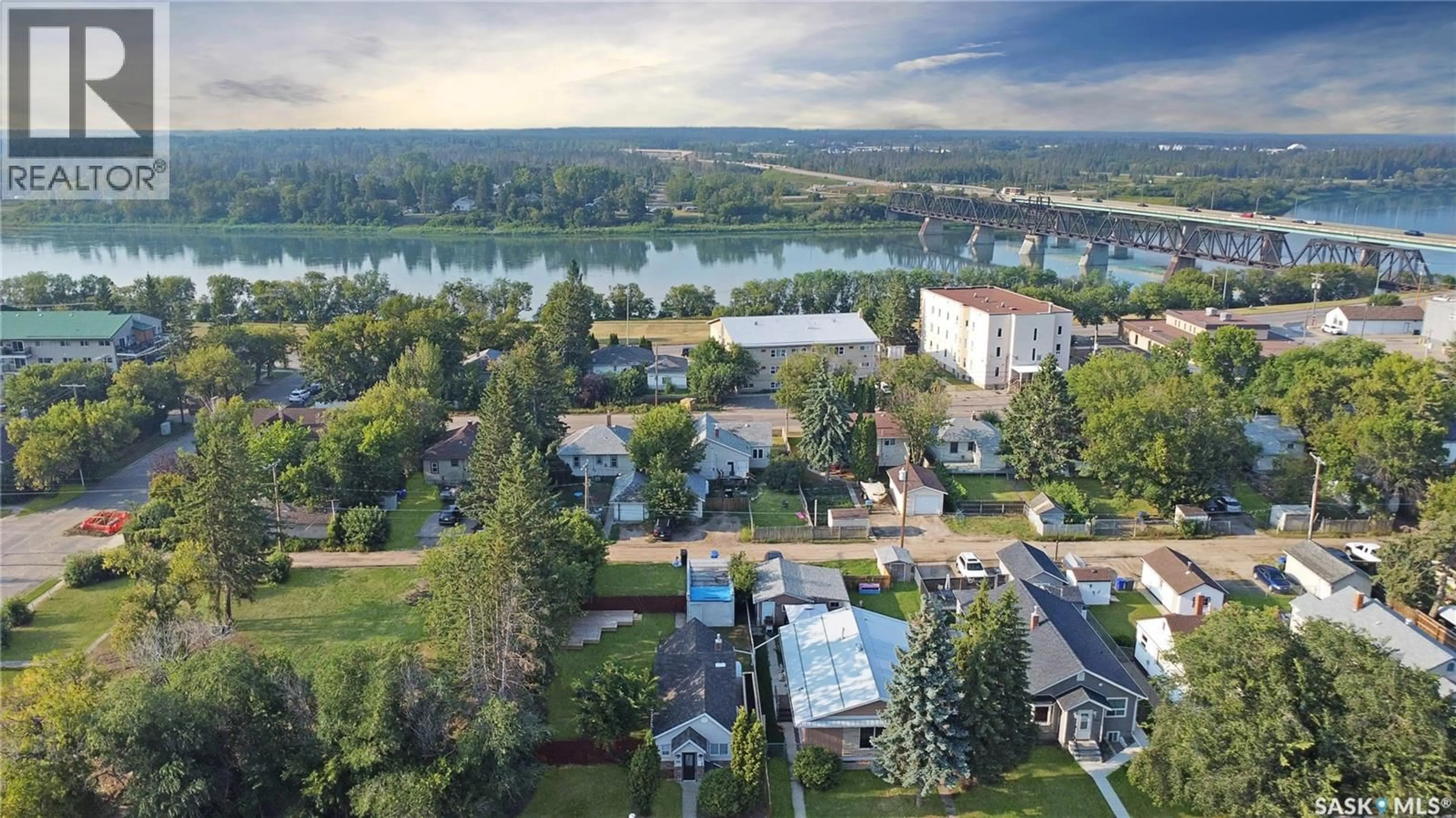 A pic from outside/outdoor area/front of a property/back of a property/a pic from drone, water/lake/river/ocean view for 356 13TH STREET, Prince Albert Saskatchewan S6V3G3