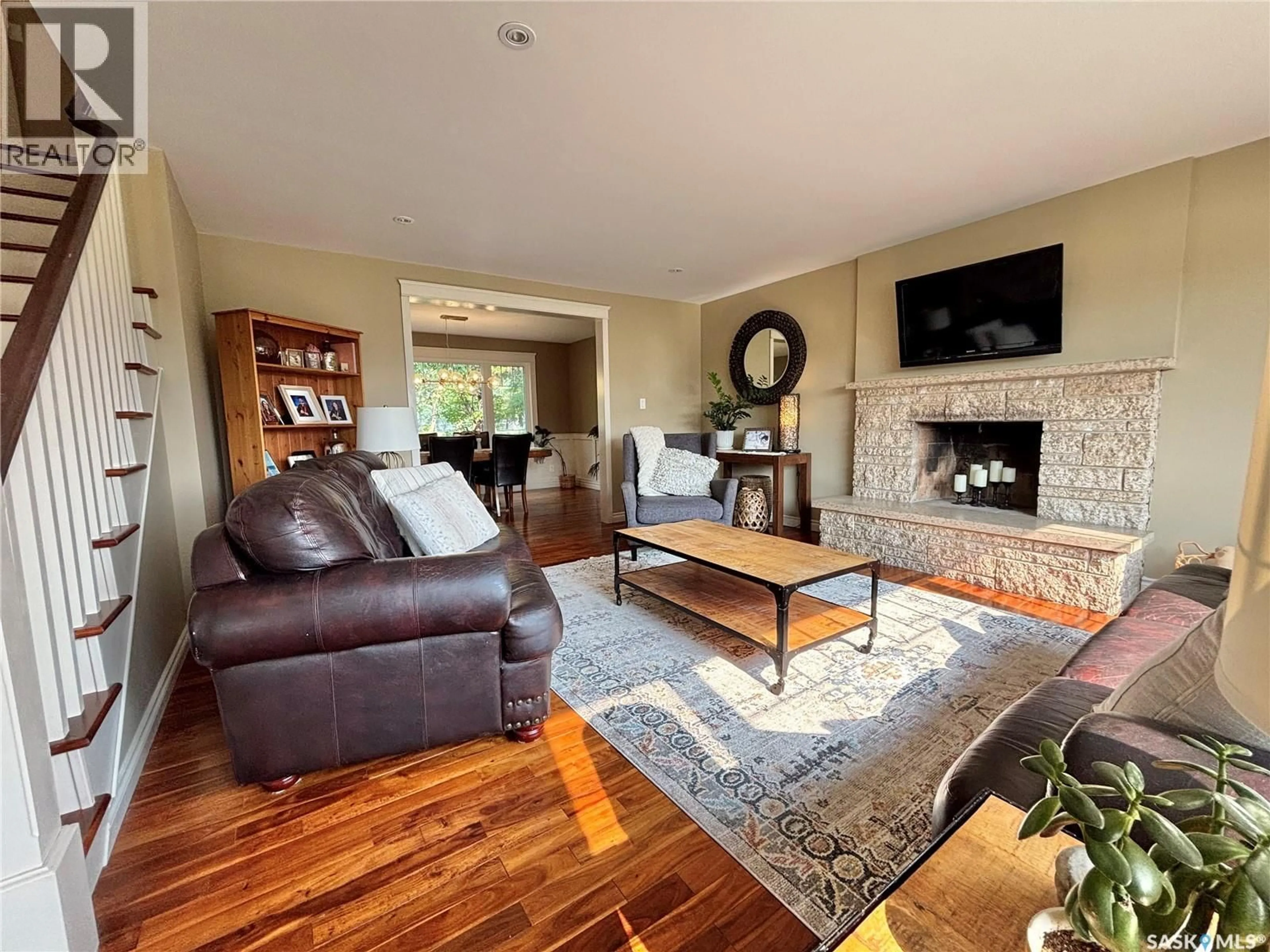 Living room with furniture, wood/laminate floor for 26 DRIFTWOOD CRESCENT, Yorkton Saskatchewan S3N2P8
