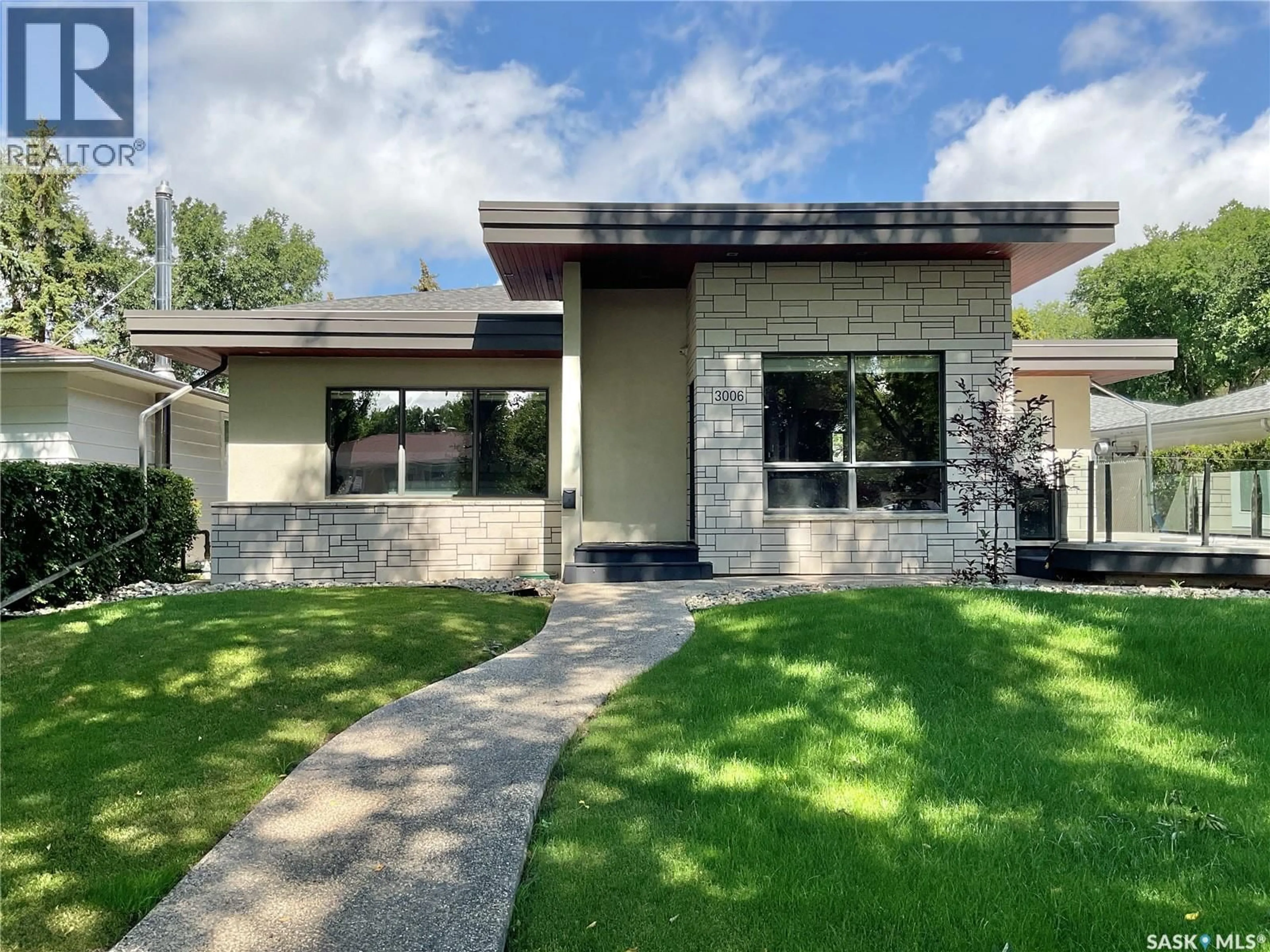 Home with brick exterior material, street for 3006 WHITMORE AVENUE, Regina Saskatchewan S4S1B8