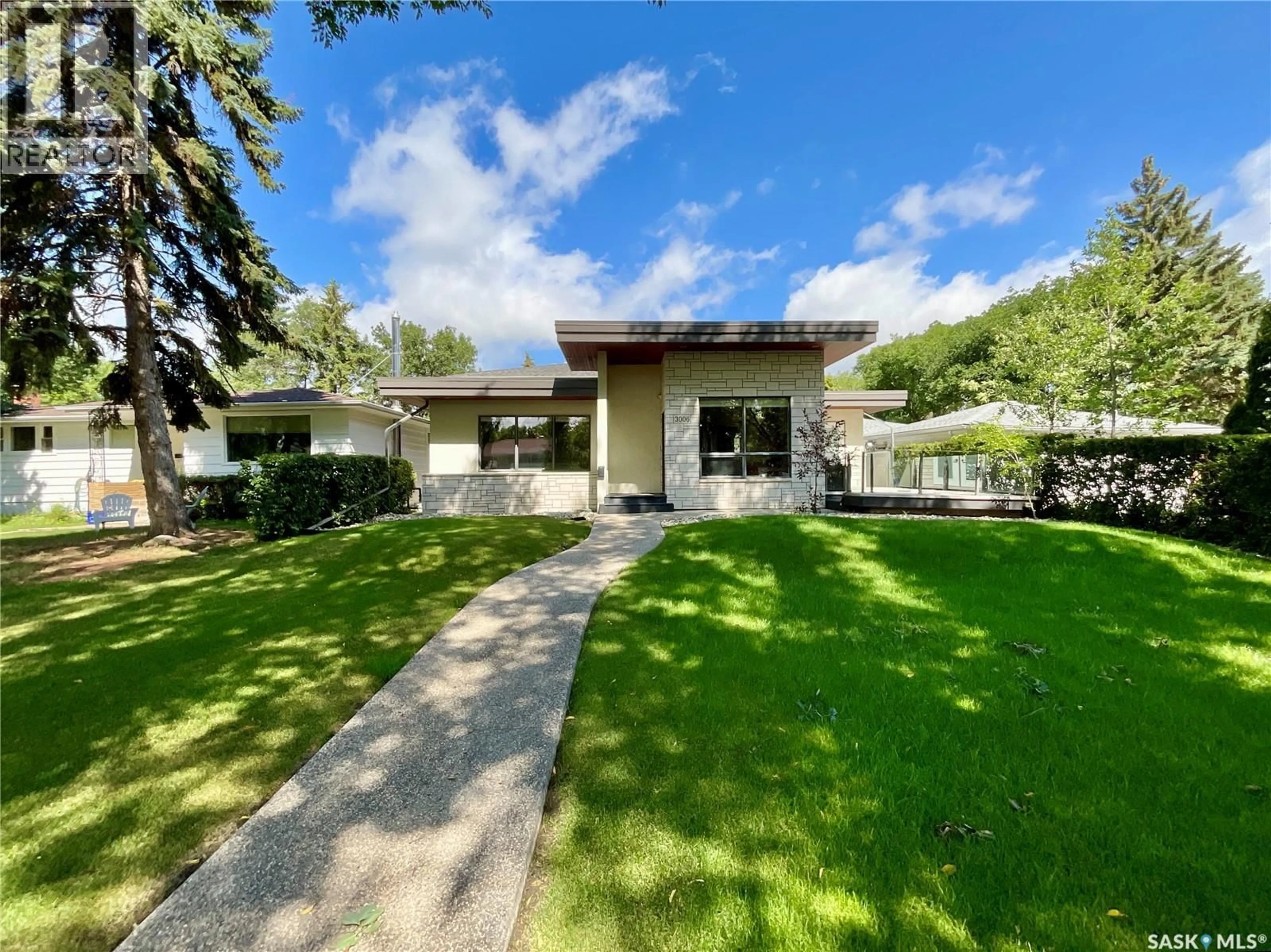 Home with vinyl exterior material, street for 3006 WHITMORE AVENUE, Regina Saskatchewan S4S1B8