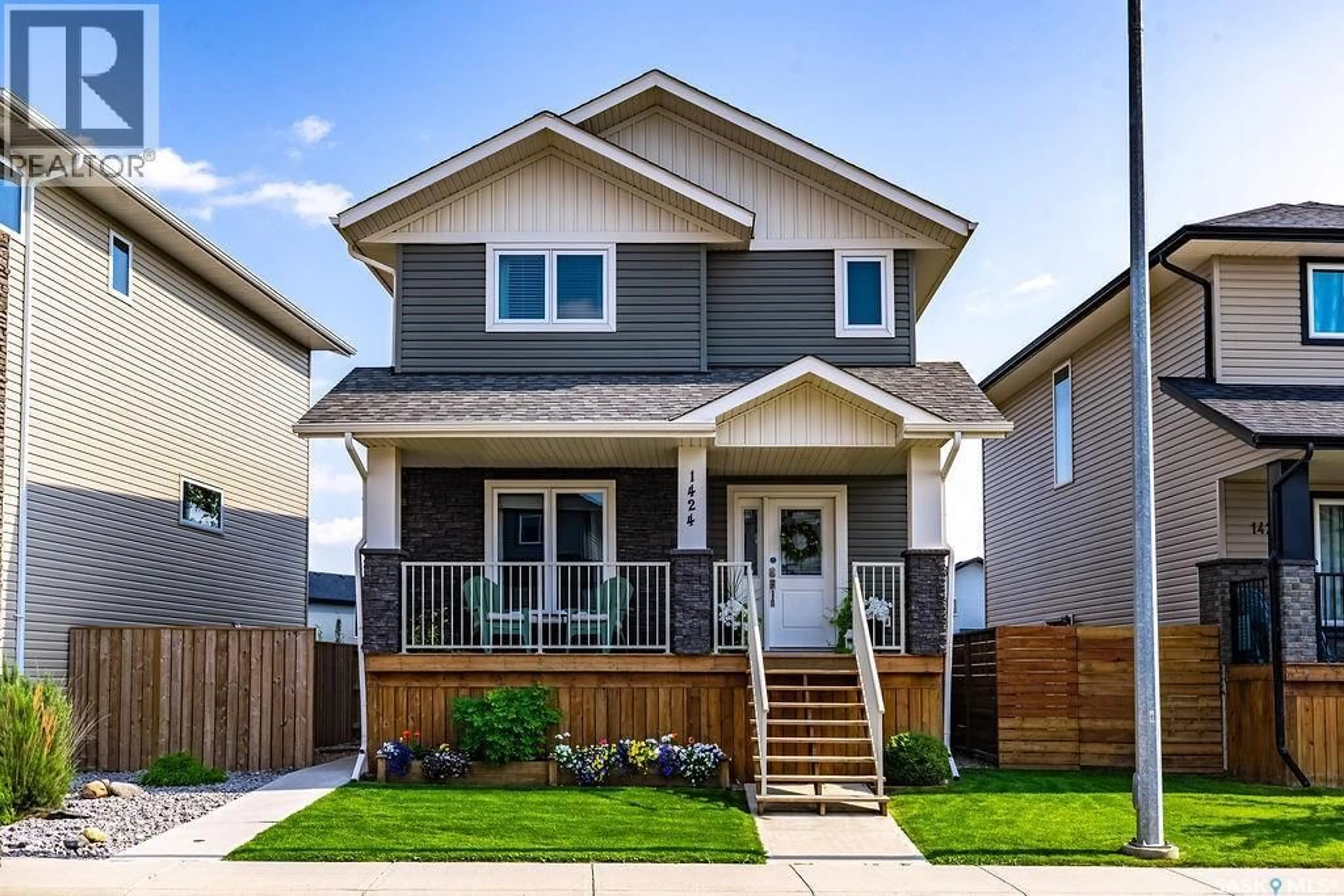 Home with vinyl exterior material, street for 1424 CASSAT DRIVE, Martensville Saskatchewan S0K2T1
