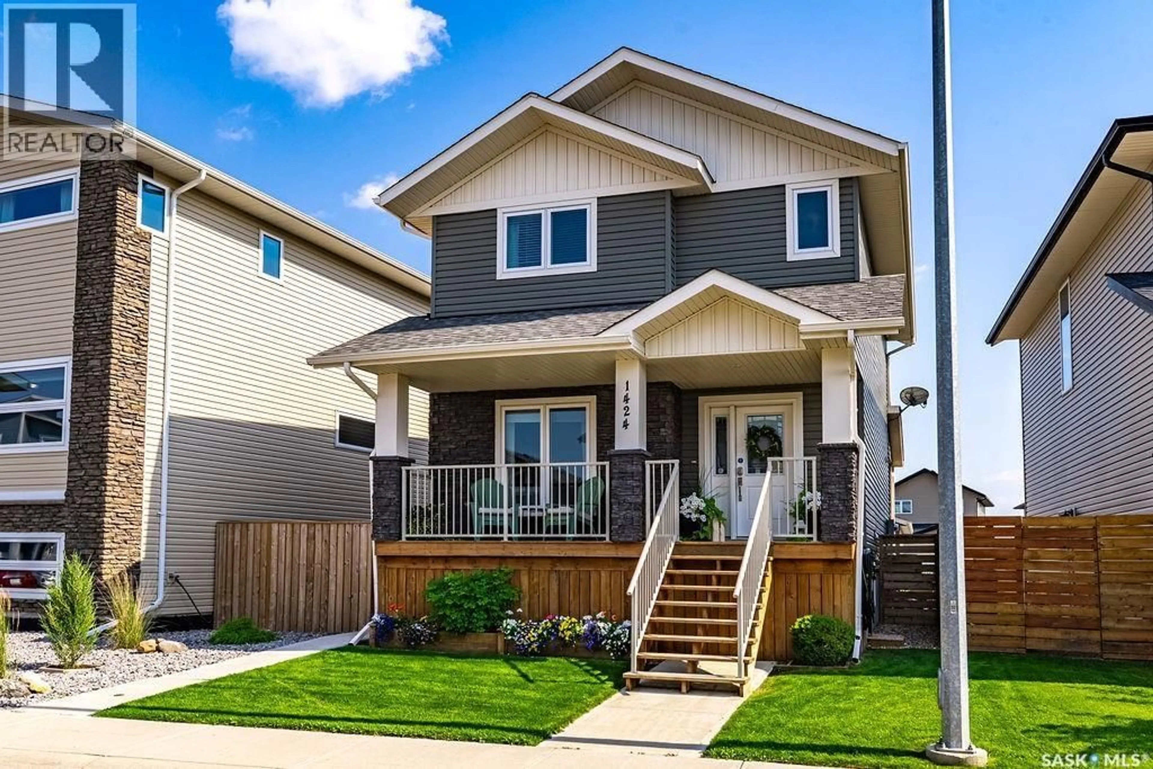 Home with vinyl exterior material, street for 1424 CASSAT DRIVE, Martensville Saskatchewan S0K2T1