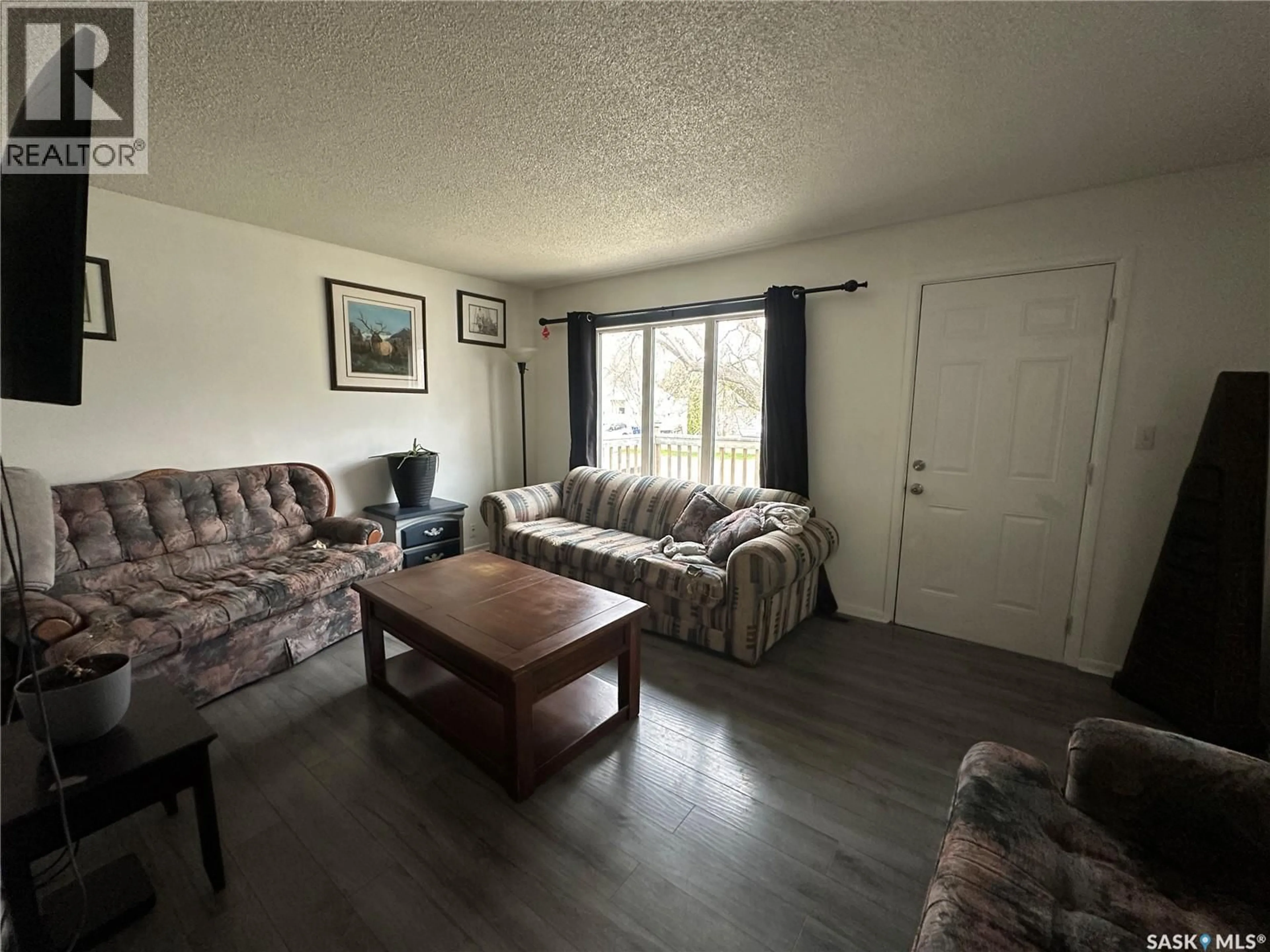 Living room with furniture, unknown for 102 9TH AVENUE, Weyburn Saskatchewan S4H1Z7